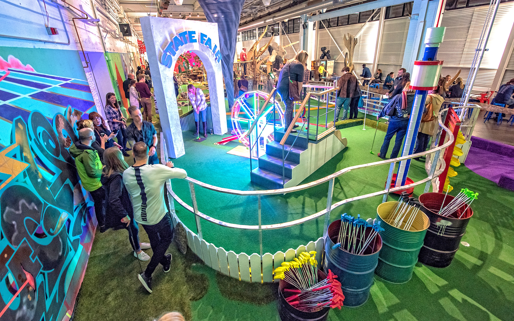 People playing mini golf at Can Can Wonderland in St. Paul