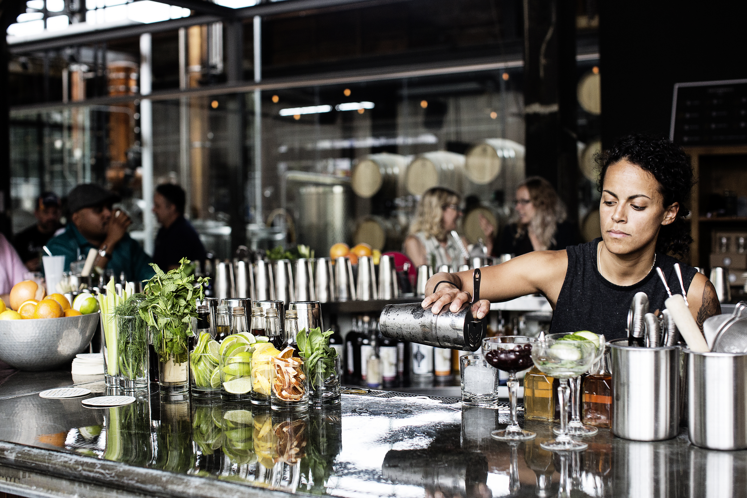 Bartender at Tattersall Distilling in Minneapolis / Photo by The Restaurant Project