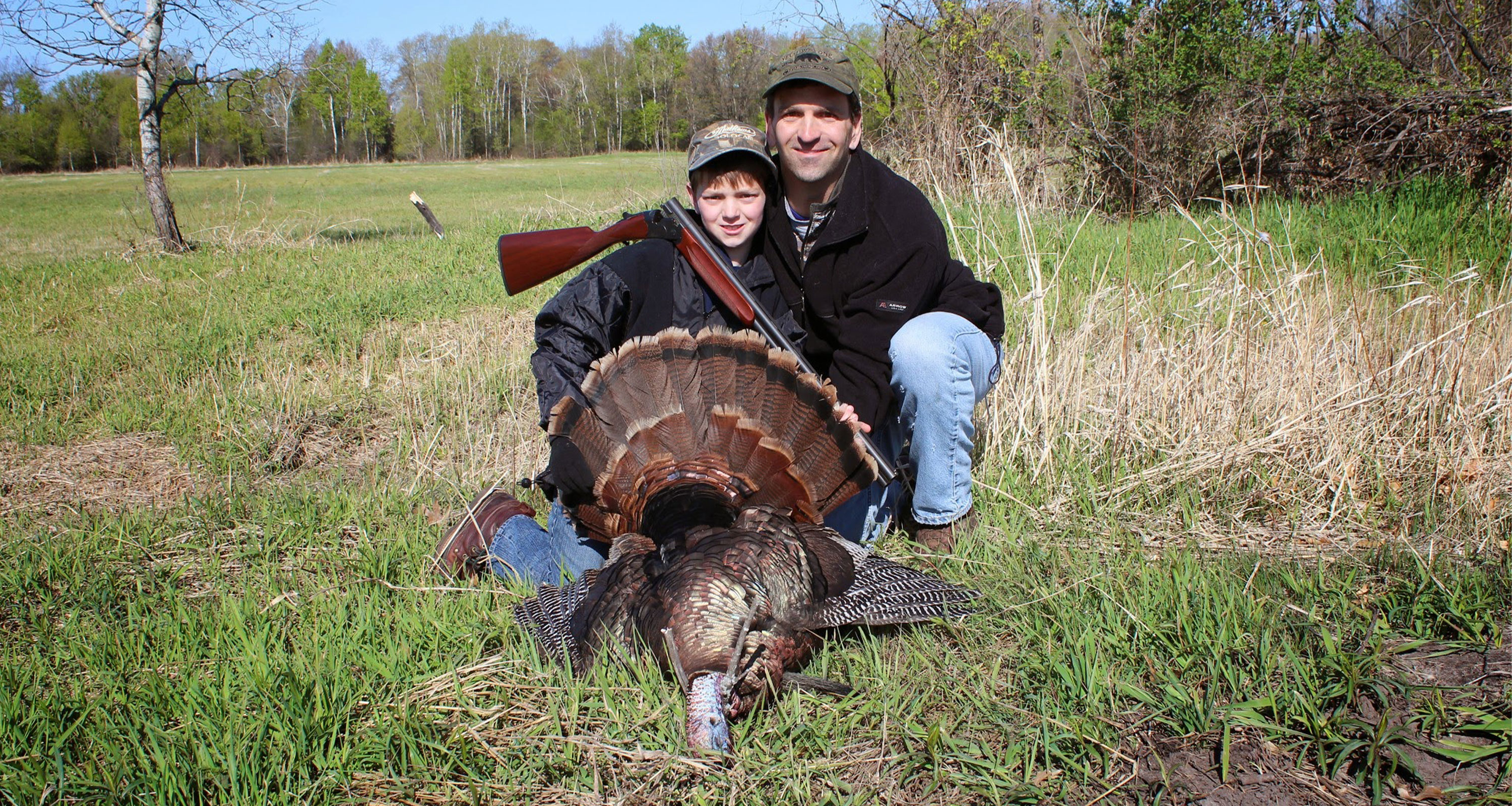 father and son turkey hunting