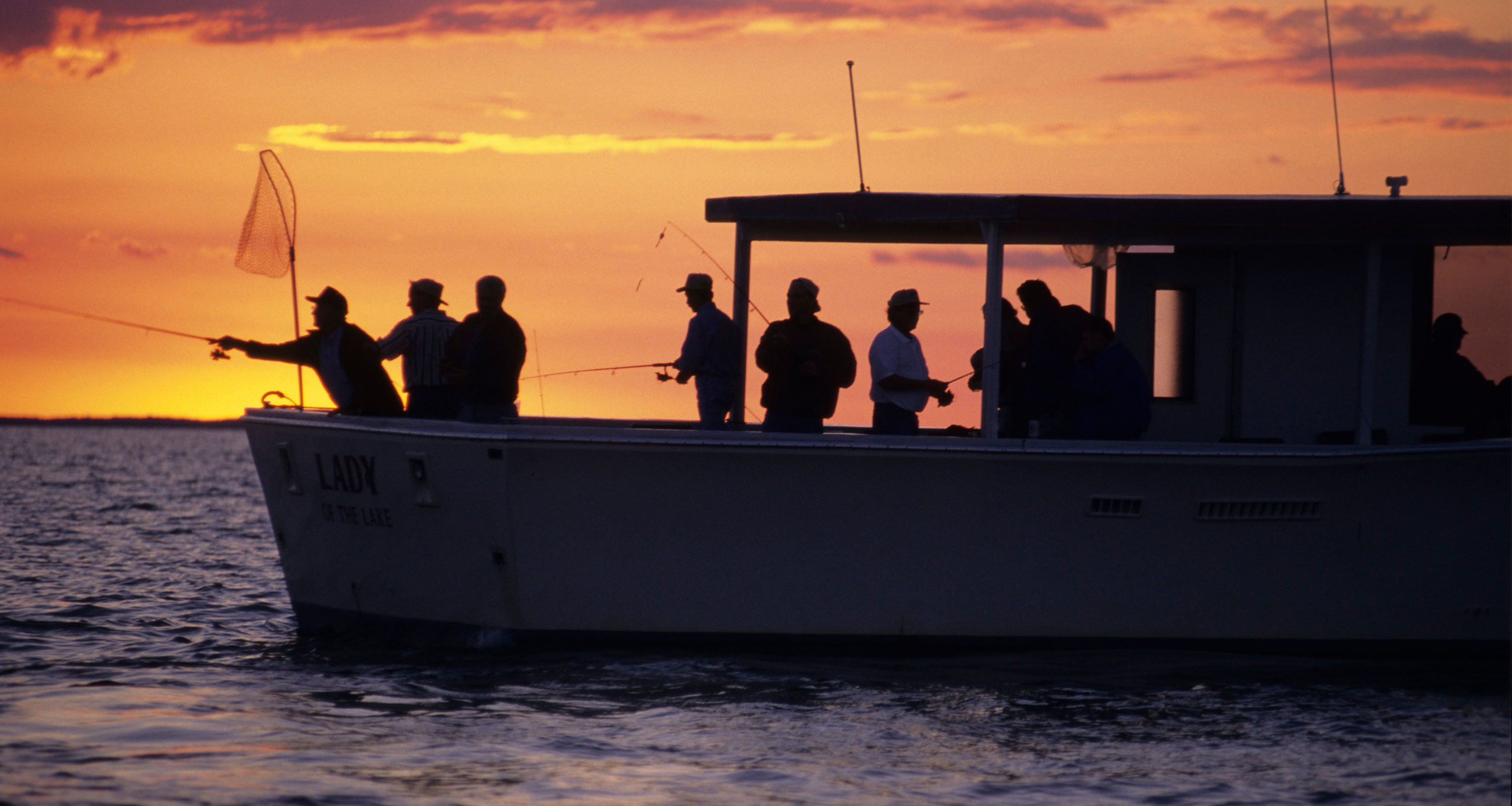 fishing on mille lacs lake at sunset