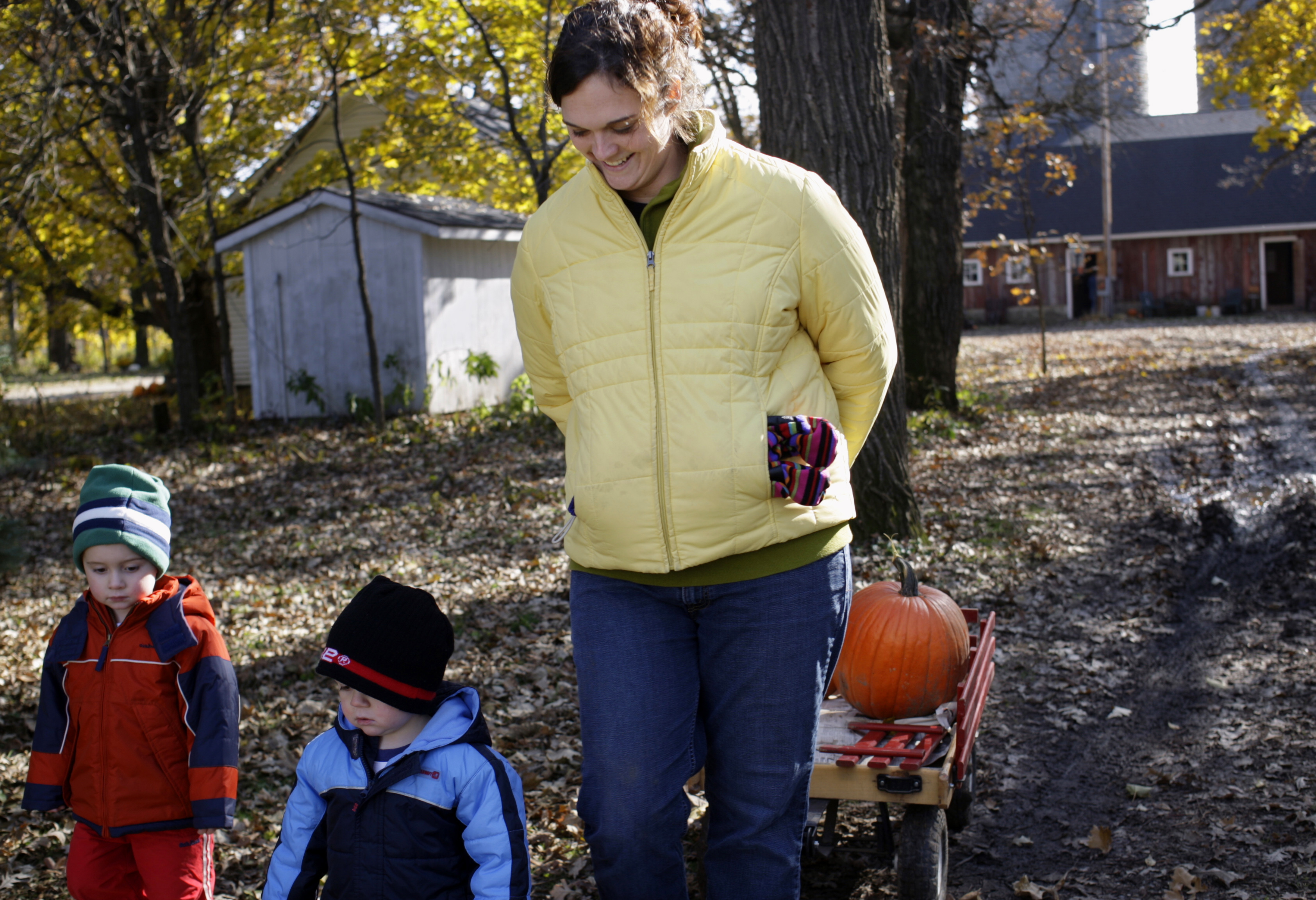 Mom and kids at pumpkin patch