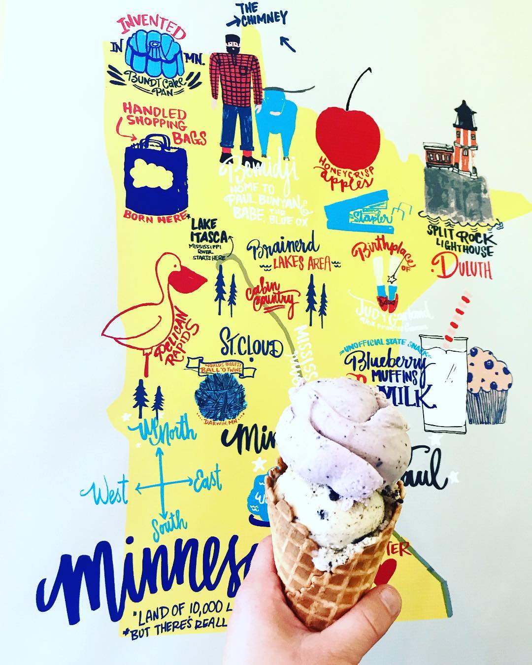 A ice-cream cone held up in front of a stylized Minnesota map