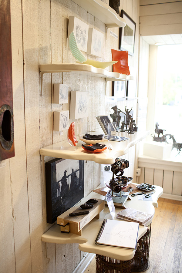 Shelves of art and home decor in Minneapolis boutique