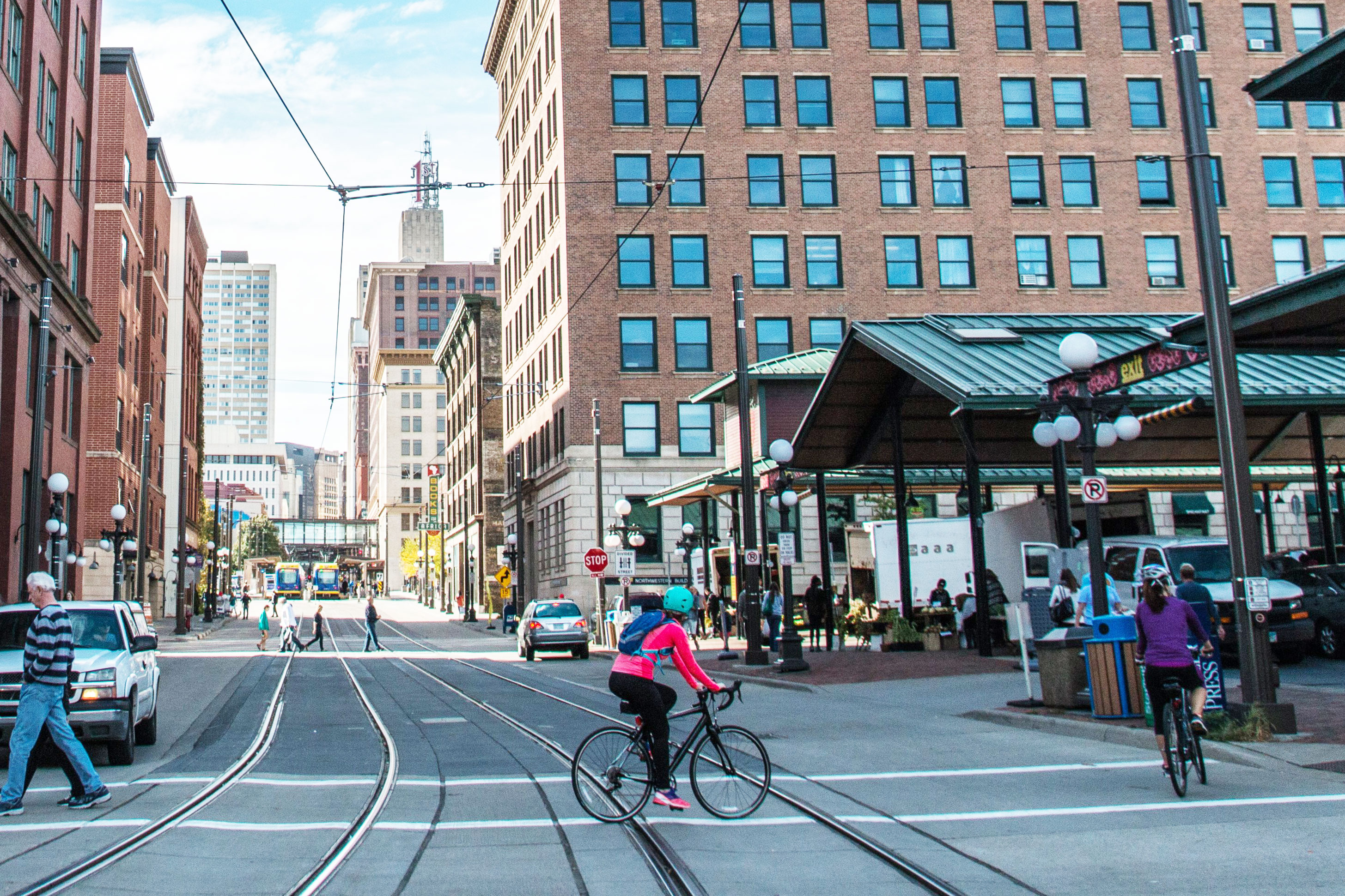 Woman biking in Lowertown St. Paul