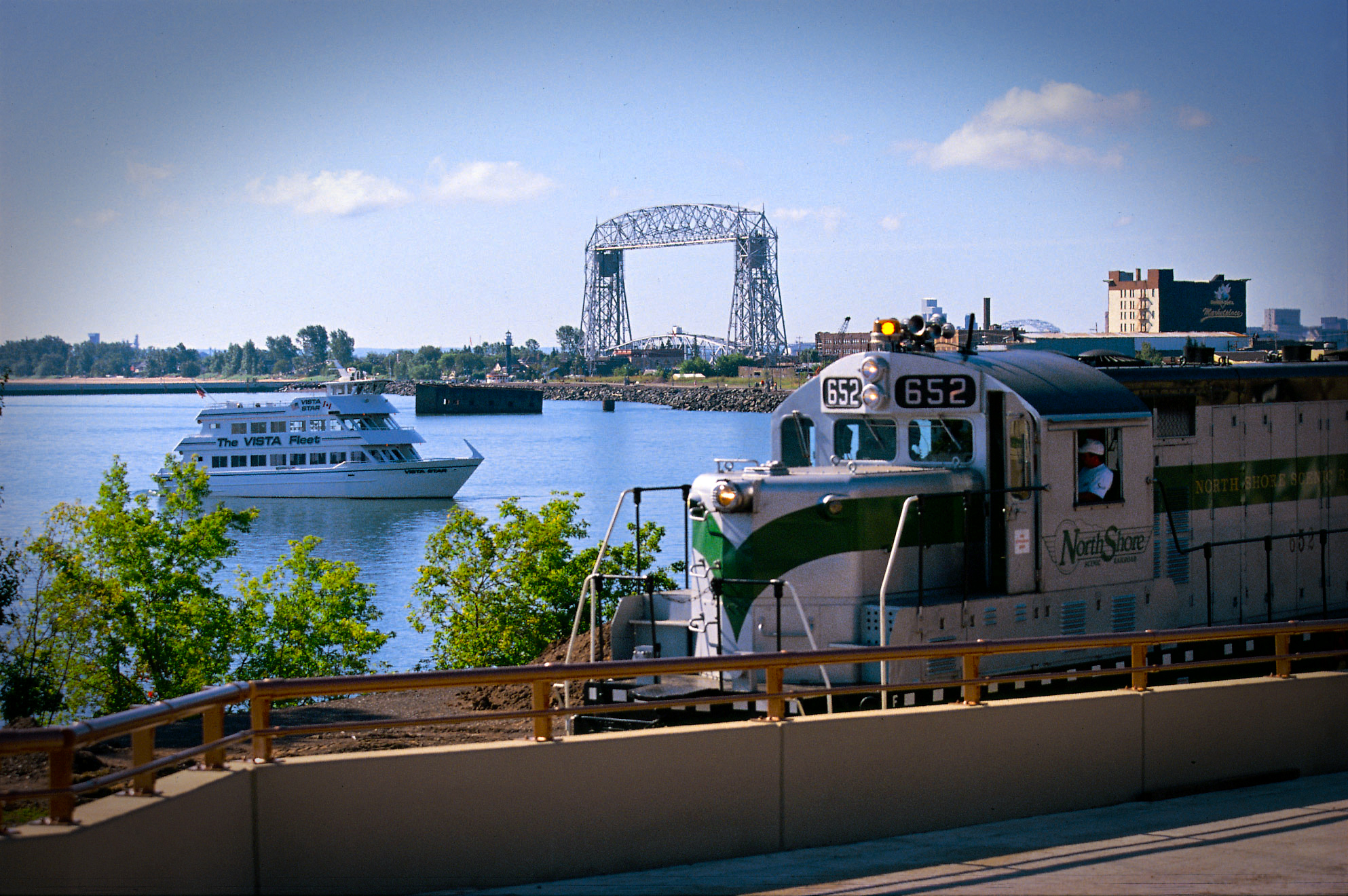 Duluth waterfront with train, boat and lift bridge