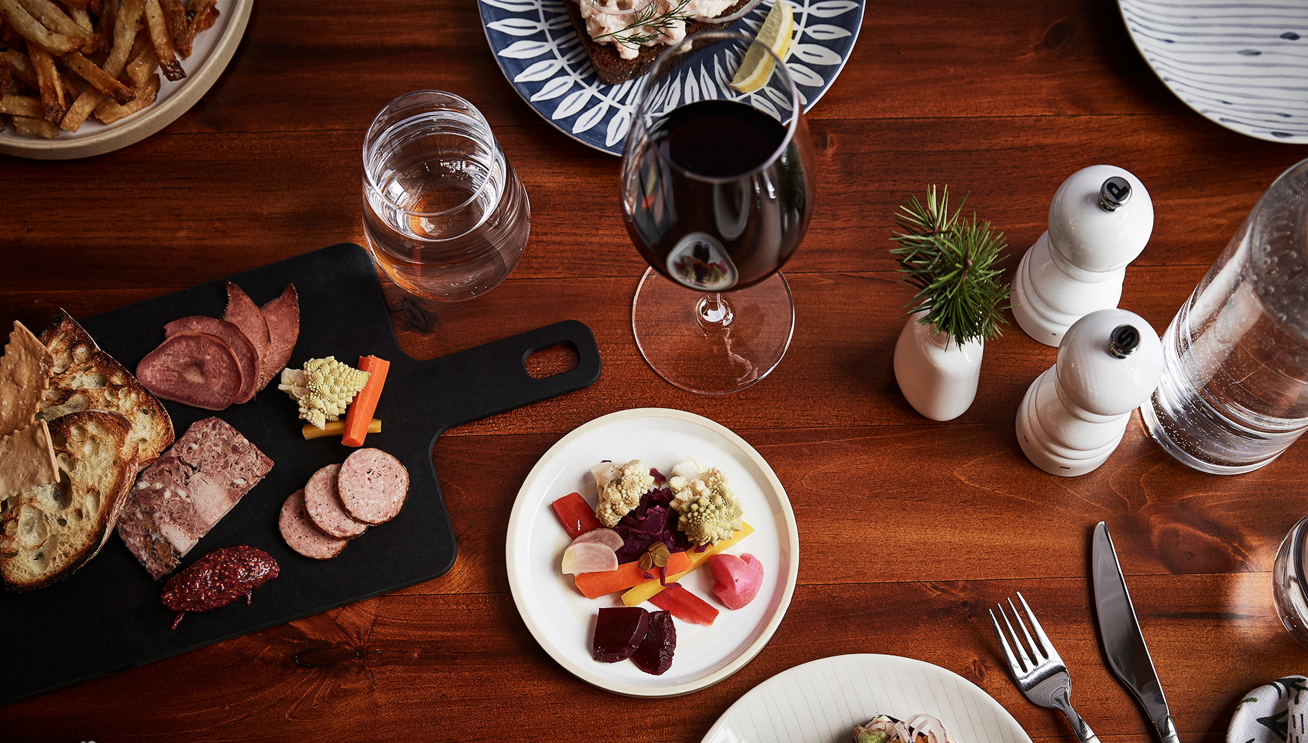 Delicious small plates and locally bottled wine at Happy Hour at Tullibee