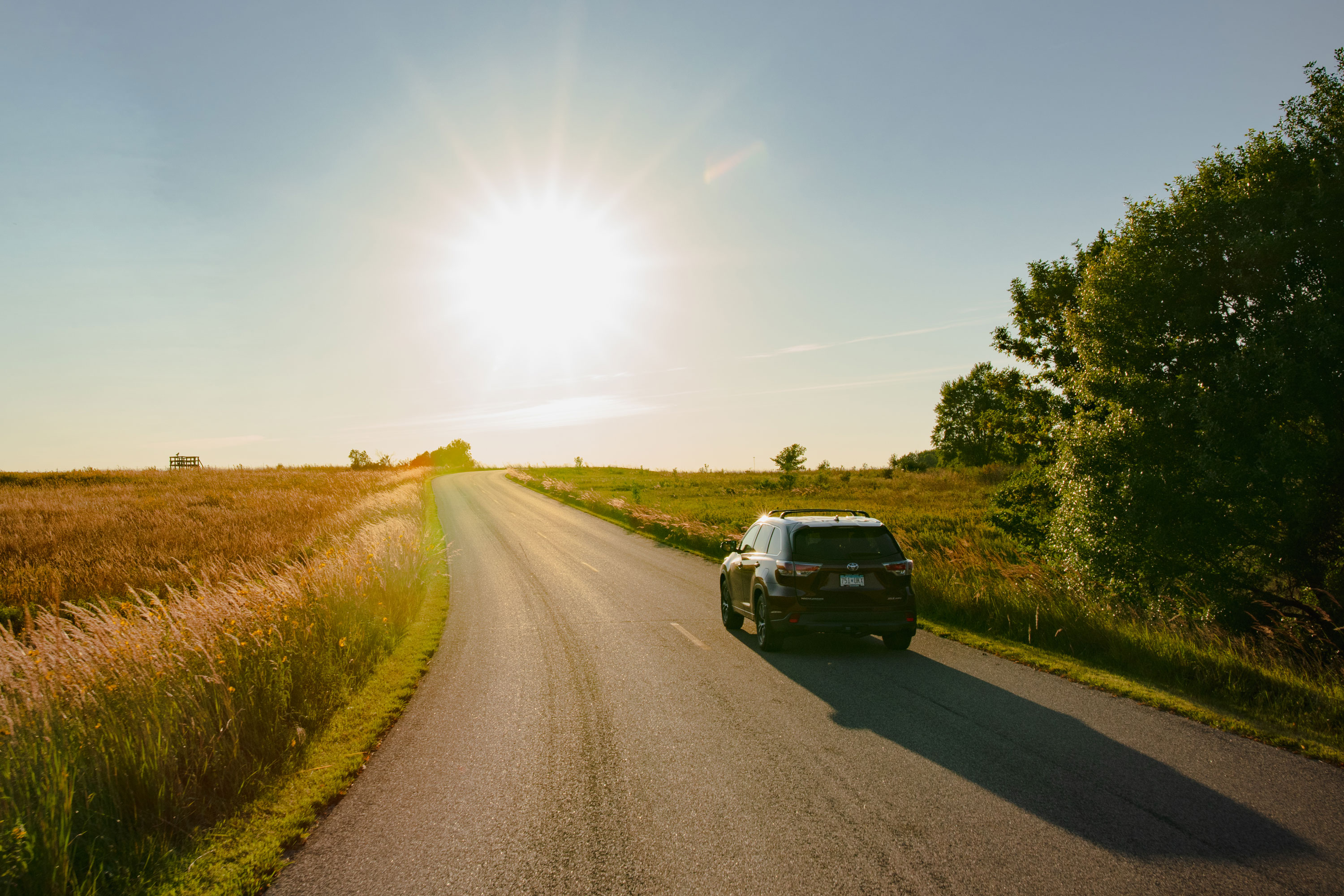 Luverne car driving through prairie