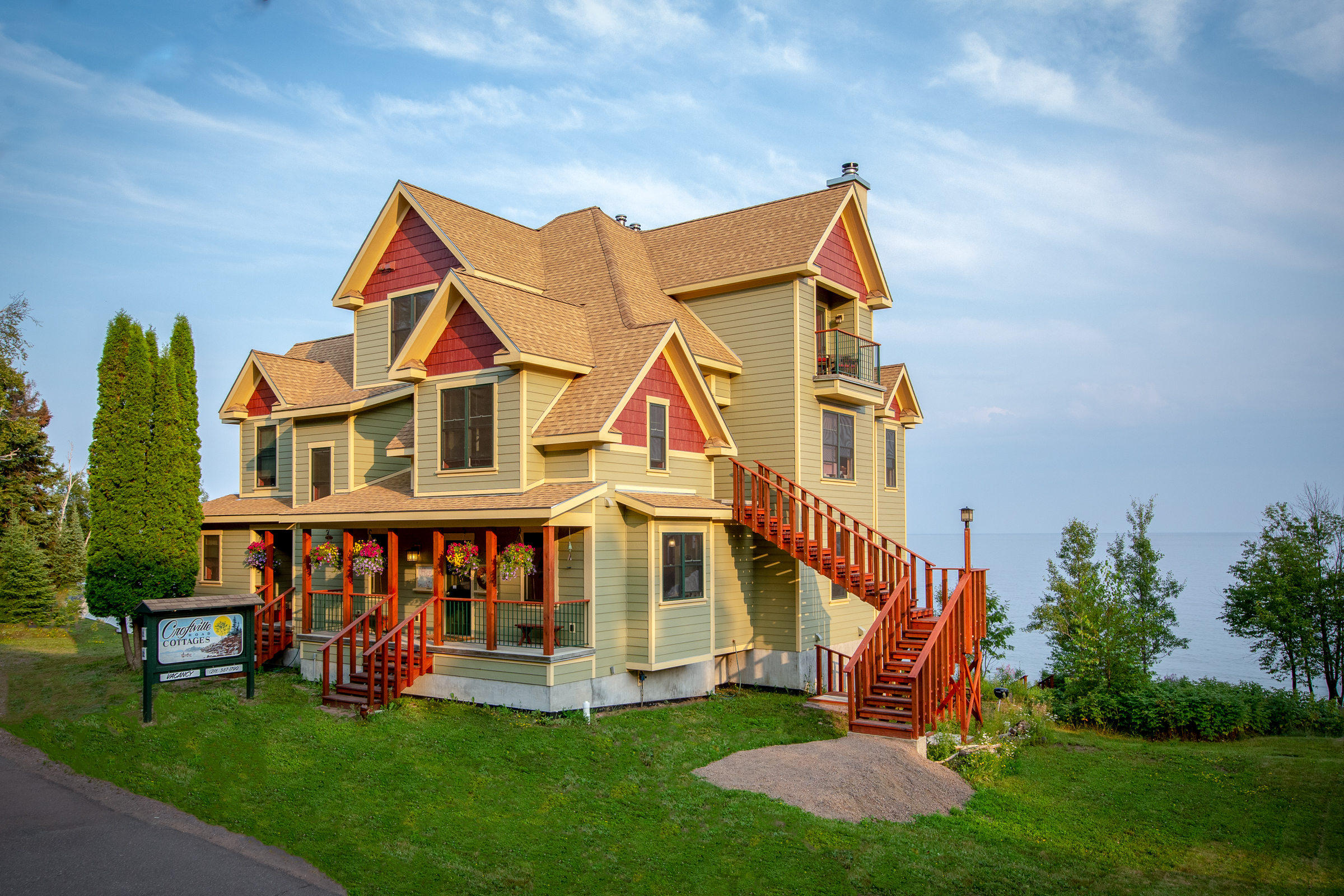 The stunning, green and red Croftville Road Cottages inn on Lake Superior