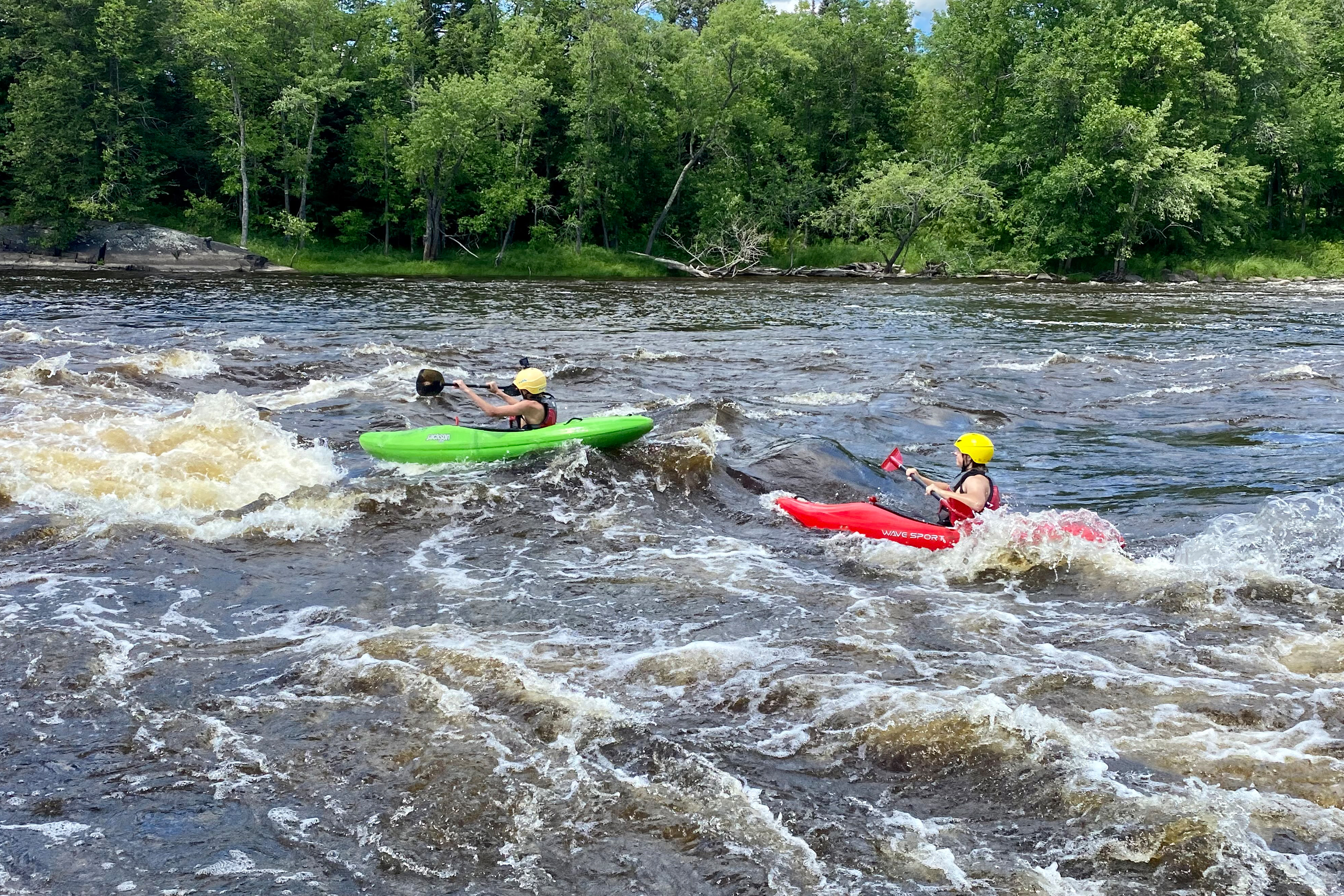 Trip leader and instructor Ryan Zimny on Electric Ledge Rapid on Upper St. Louis River