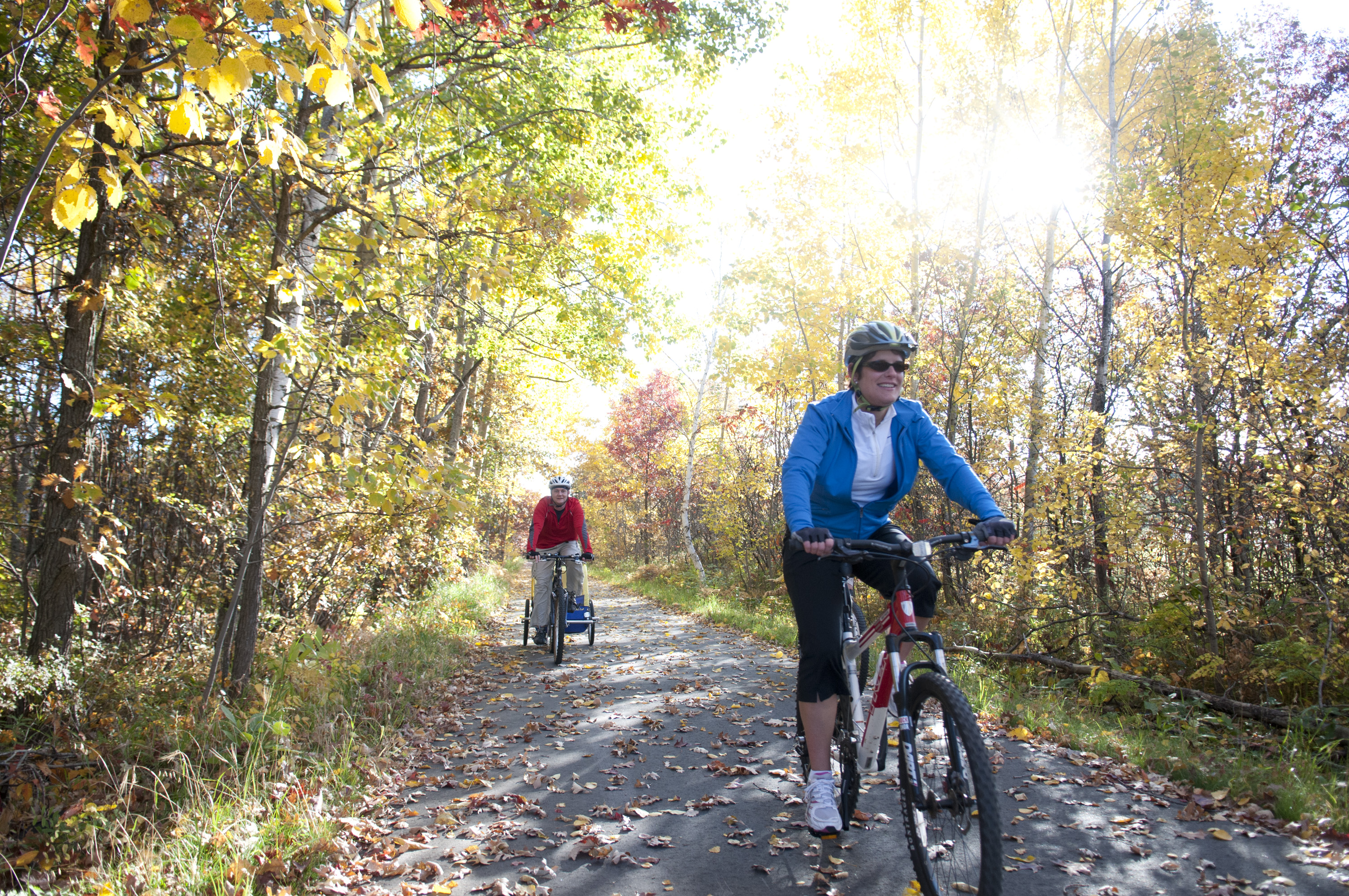 2 people biking on the Paul Bunyan Heartland bike trails near Walker