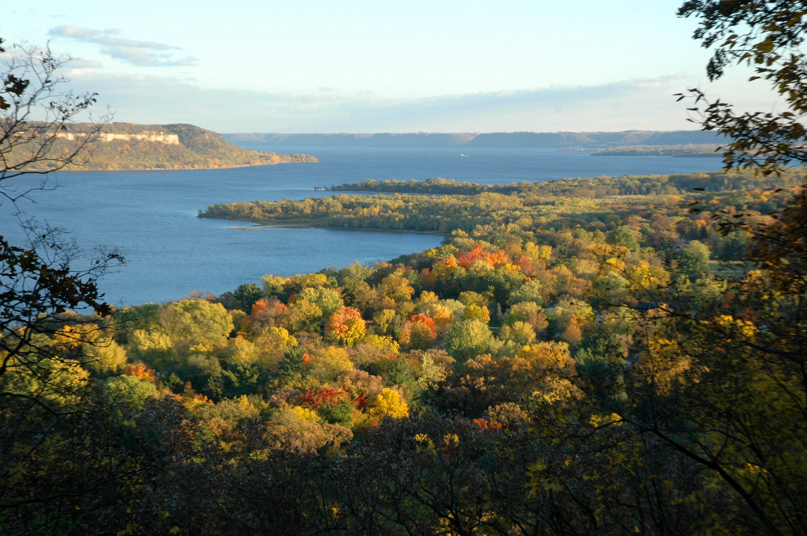 aerial view of fall color along the Mississippi River on a sunny day