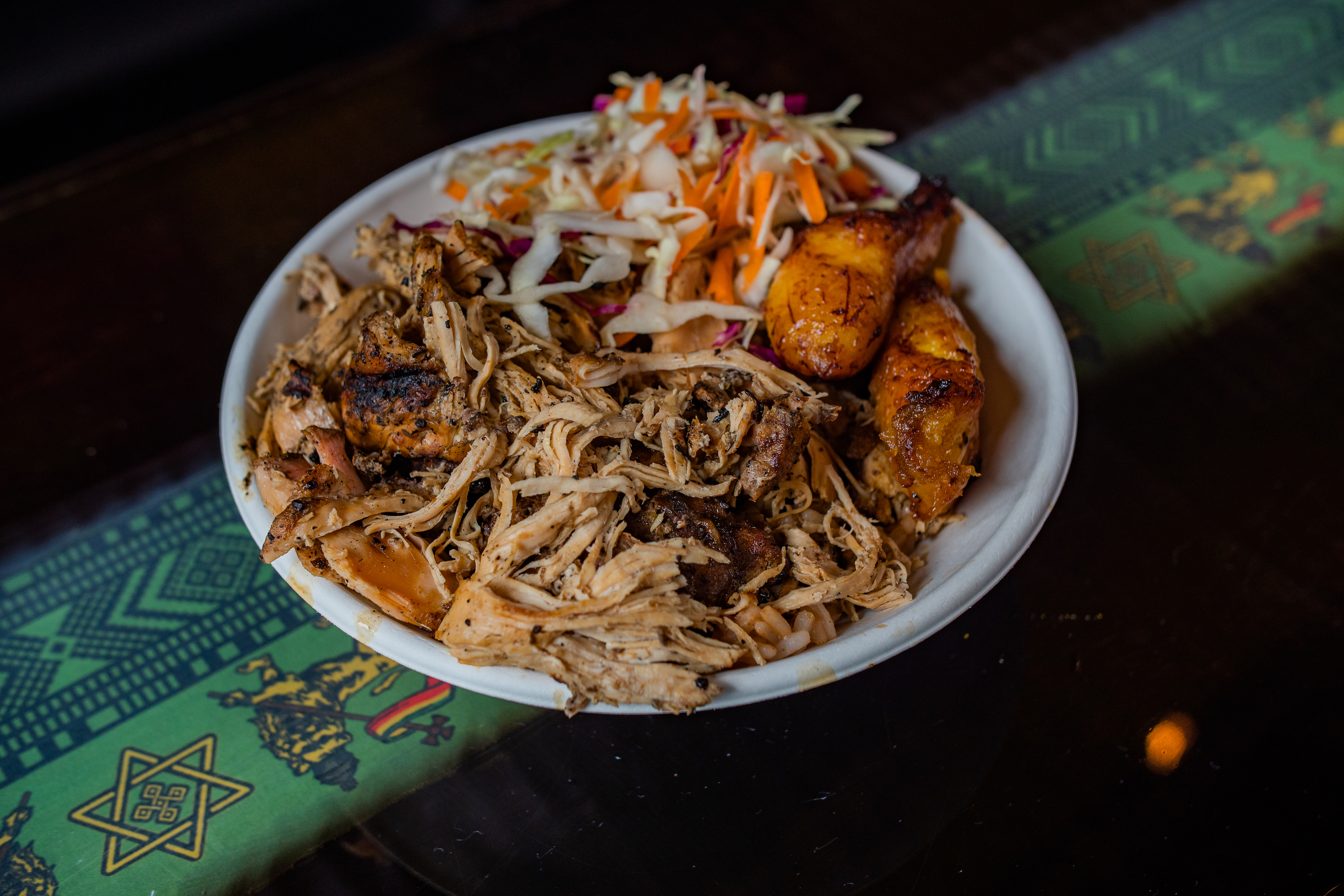 The slow-roasted jerk pork plate at Pimento Kitchen