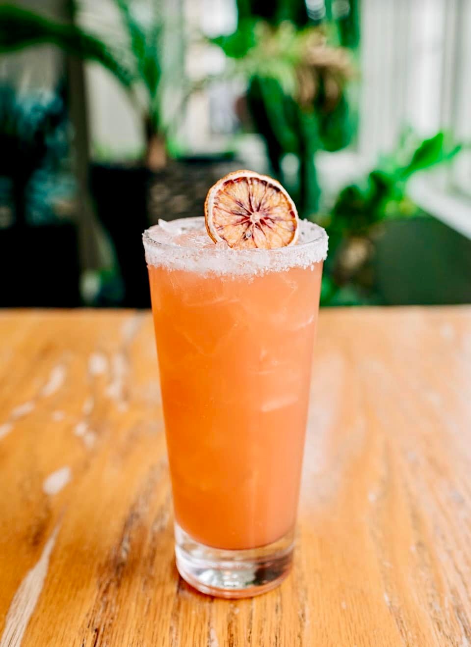 A blood orange margarita on the patio of Nico's Taco Bar