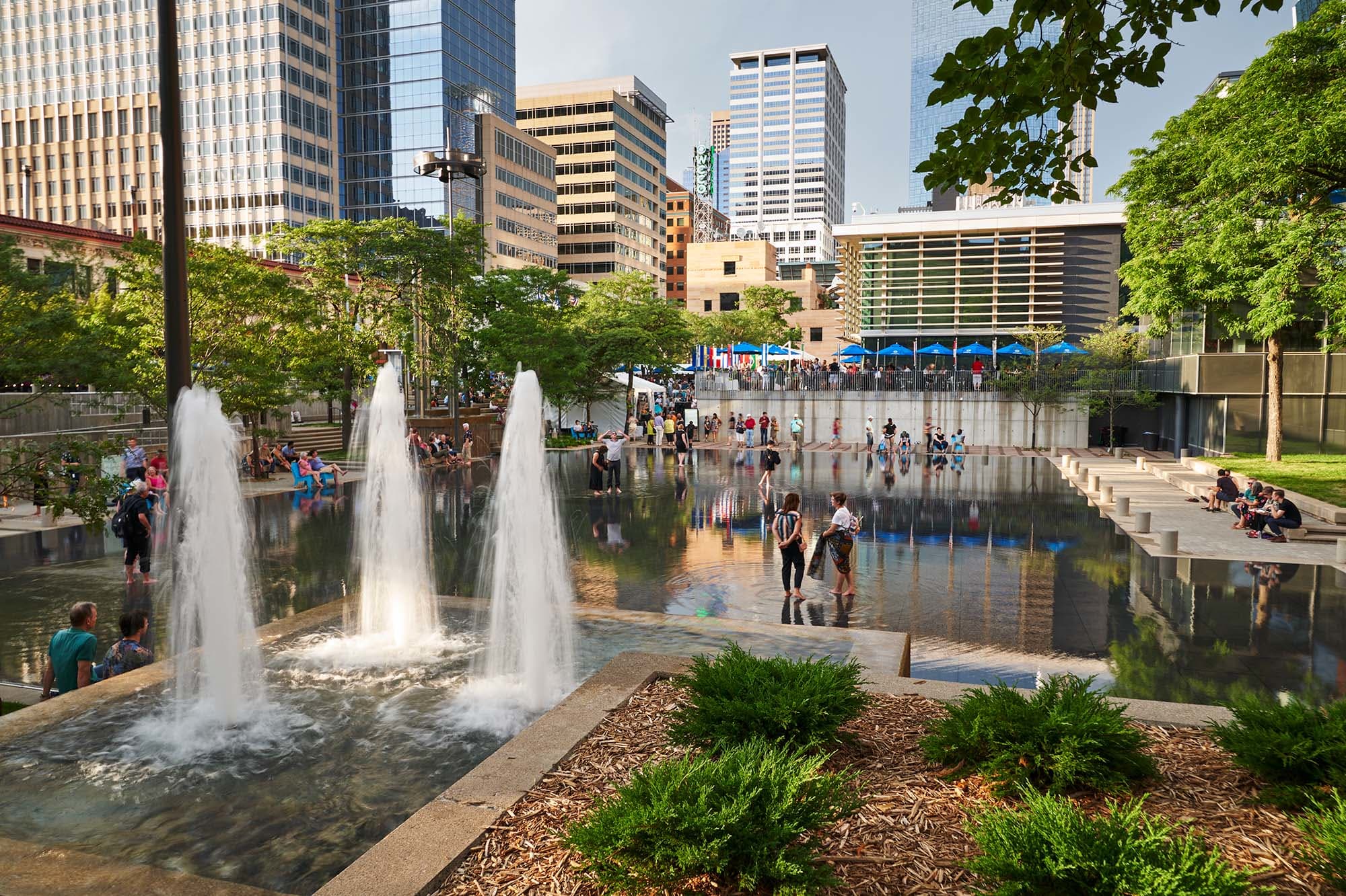 A packed Peavy Plaza during peak summer in downtown Minneapolis