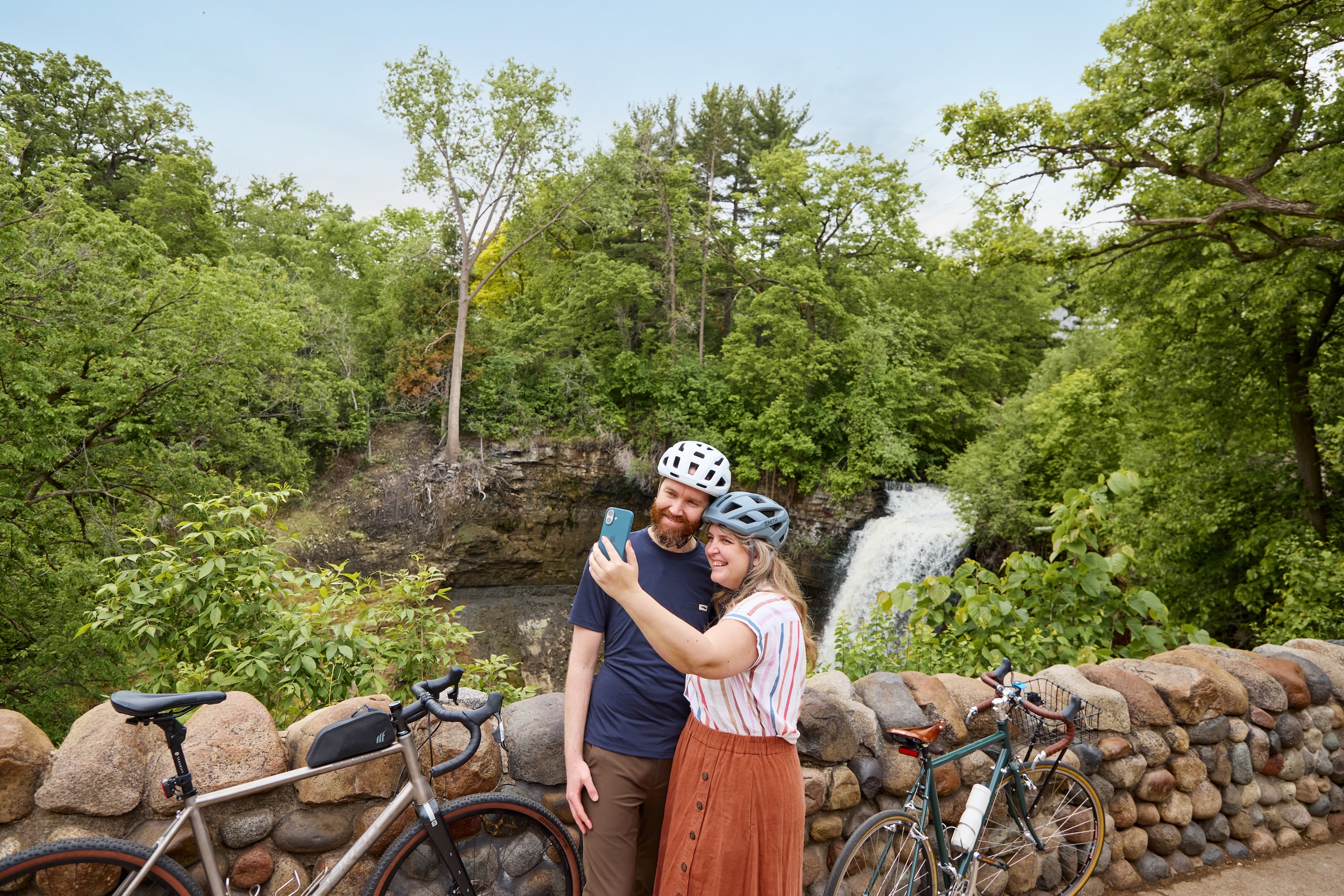 A couple bikers snap a selfie near Minnehaha Falls