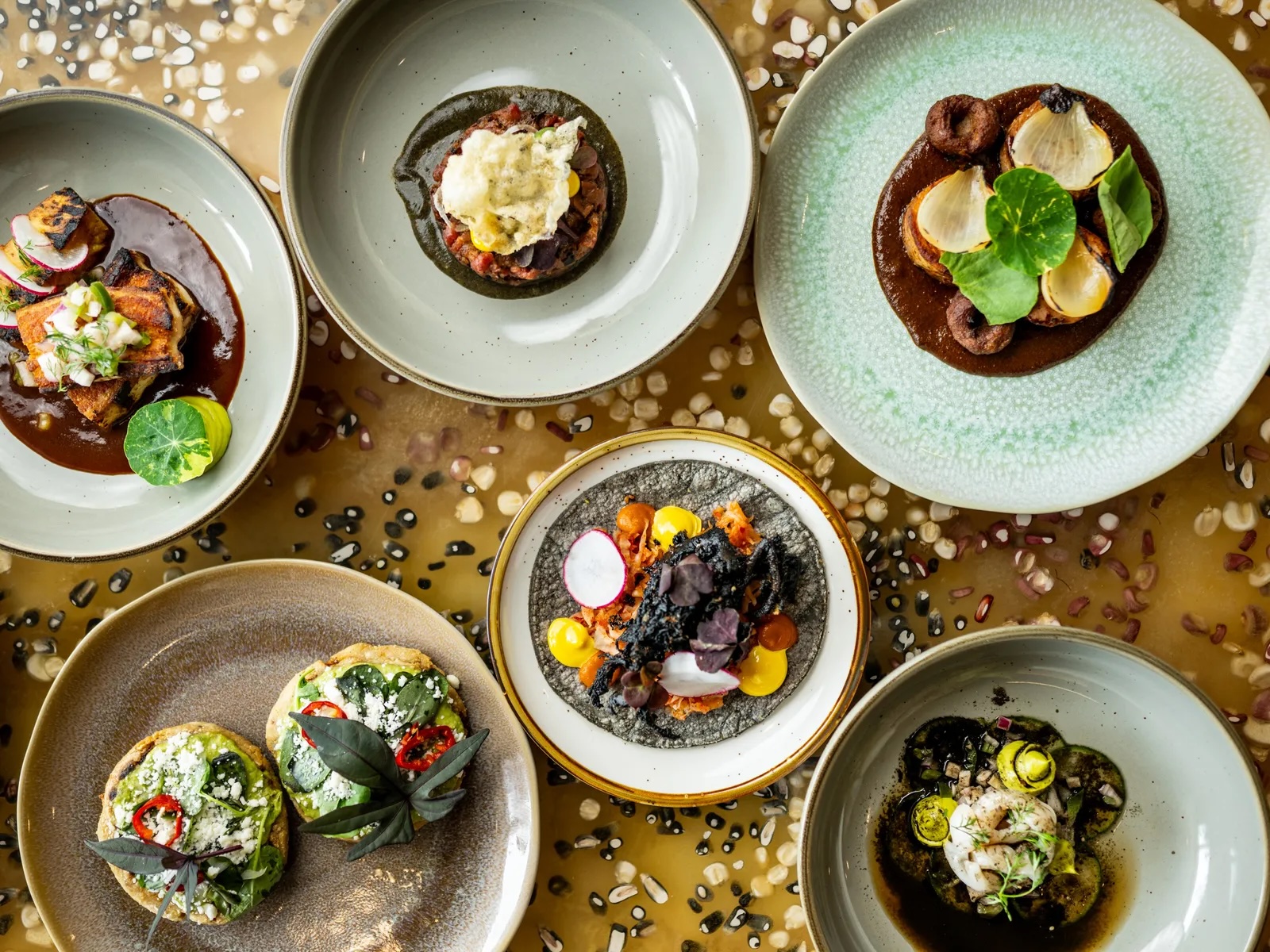 A spread of Mexican food at Oro by Nixta