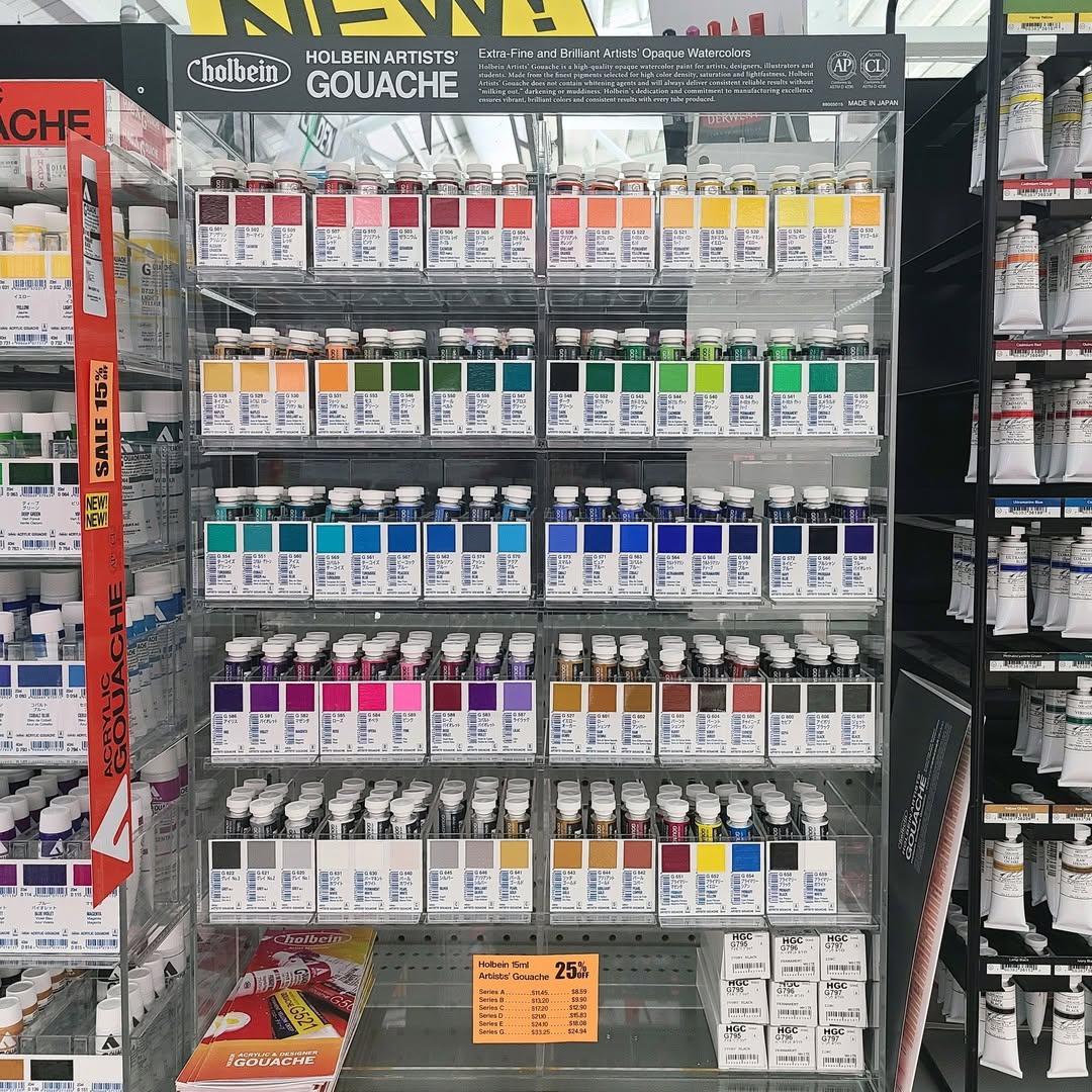 A sale display of opaque watercolors at Art Materials