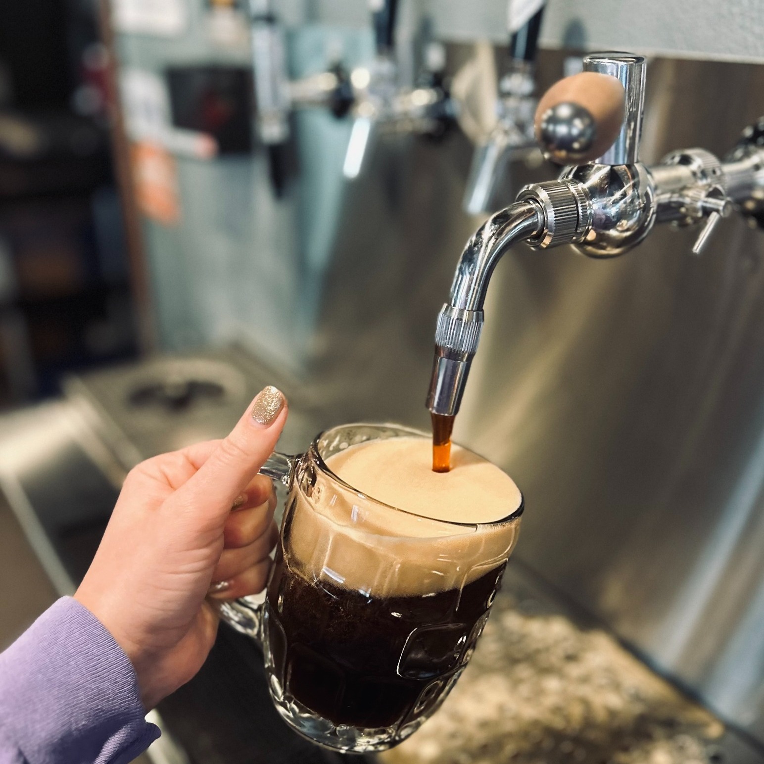A foamy side pull pour of Bemidji Brewing's Czech Dark Lager