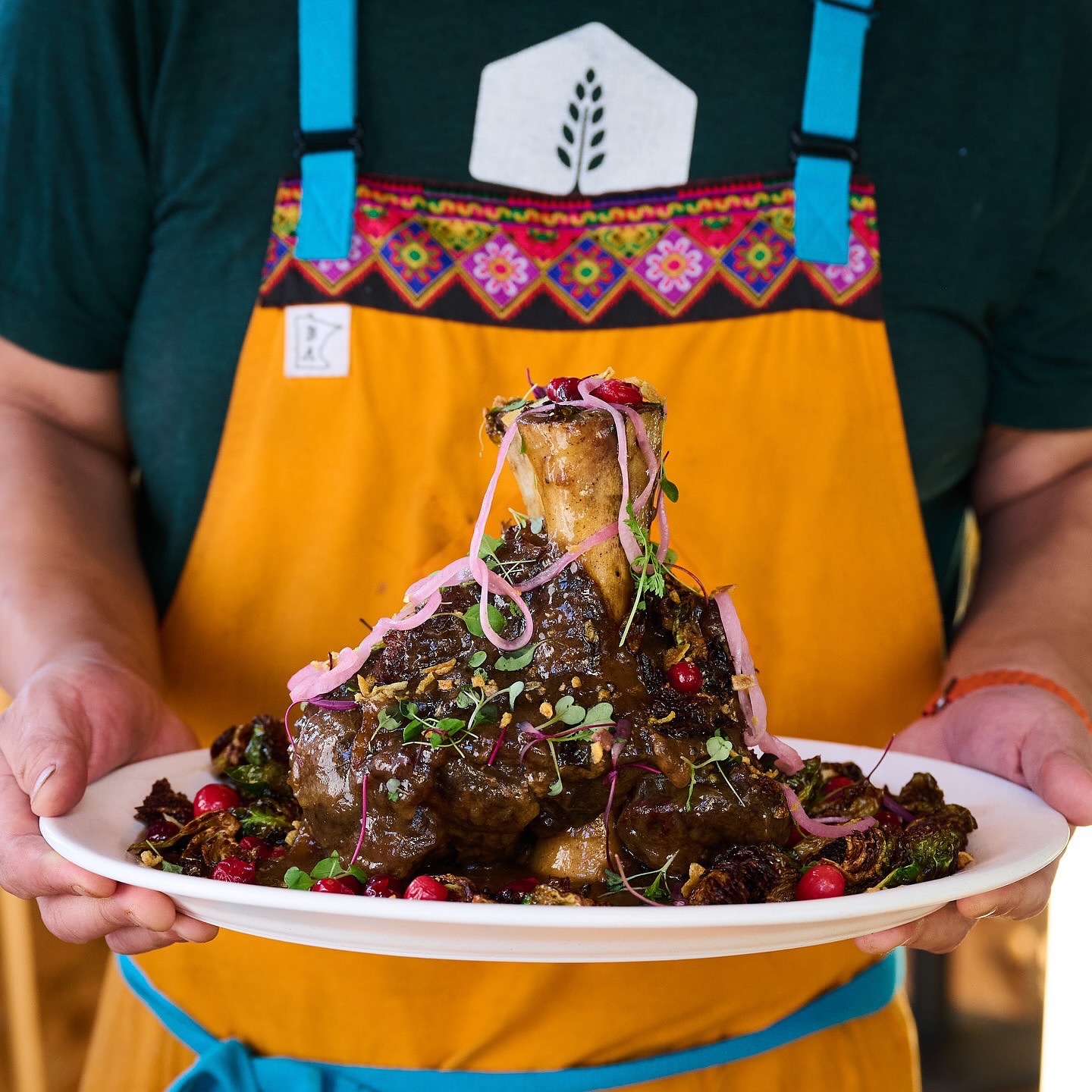 Vinai chef Yia Vang wears a custom BA Craftmade apron