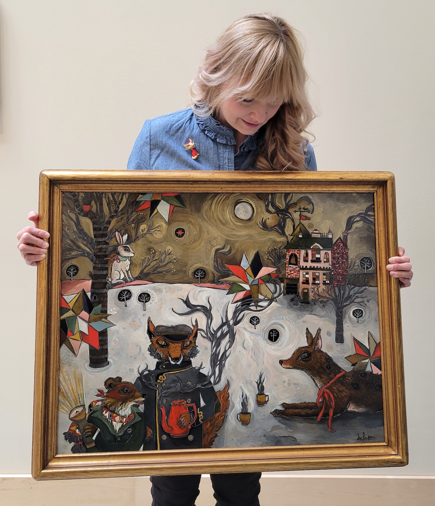 Artist Dawn Candace Silvernagle holds one of her DC Ice pieces