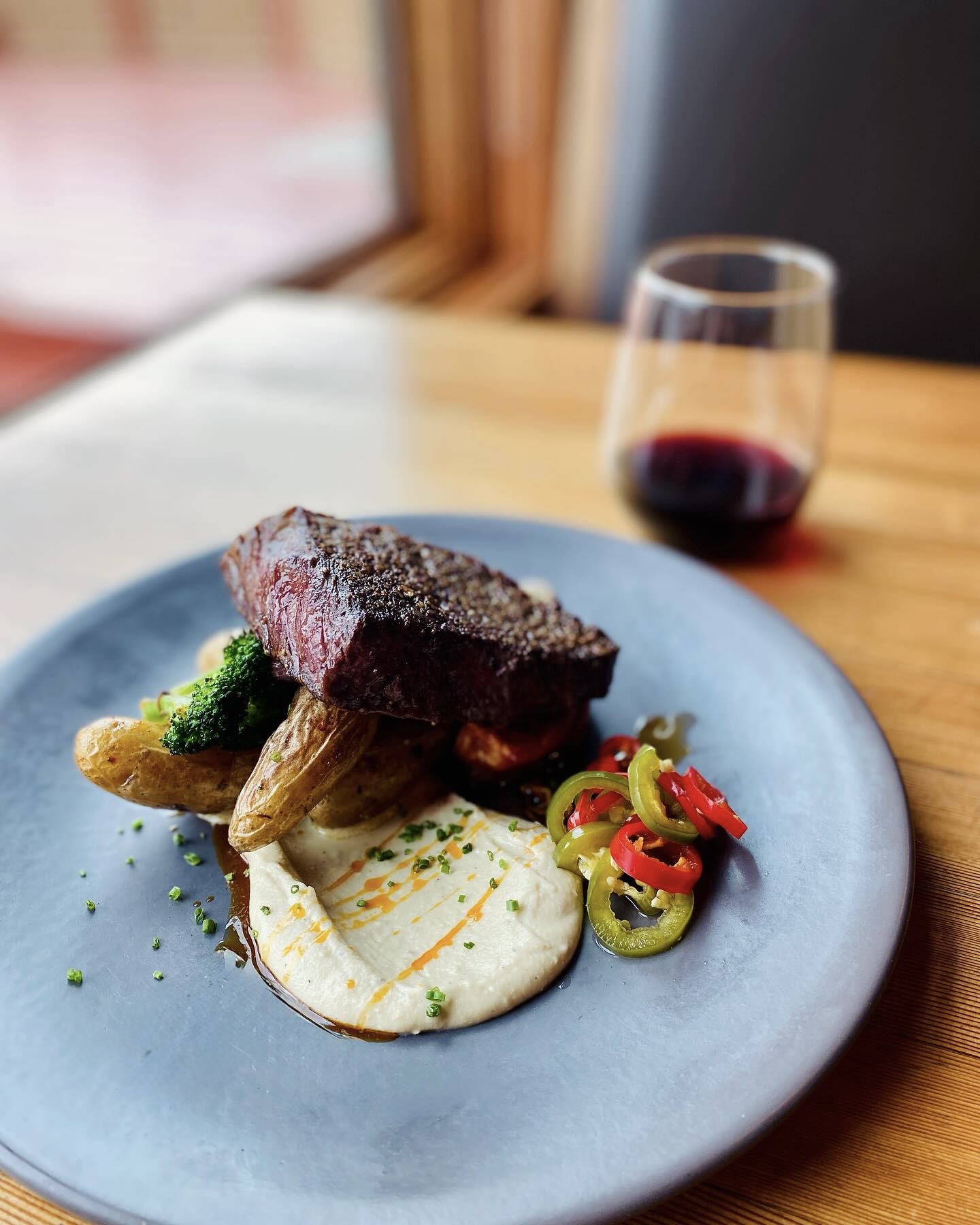 An elegantly plated steak dinner at Lake Avenue