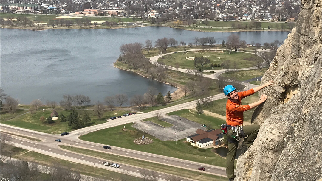 A climber on Sugar Loaf Bluff