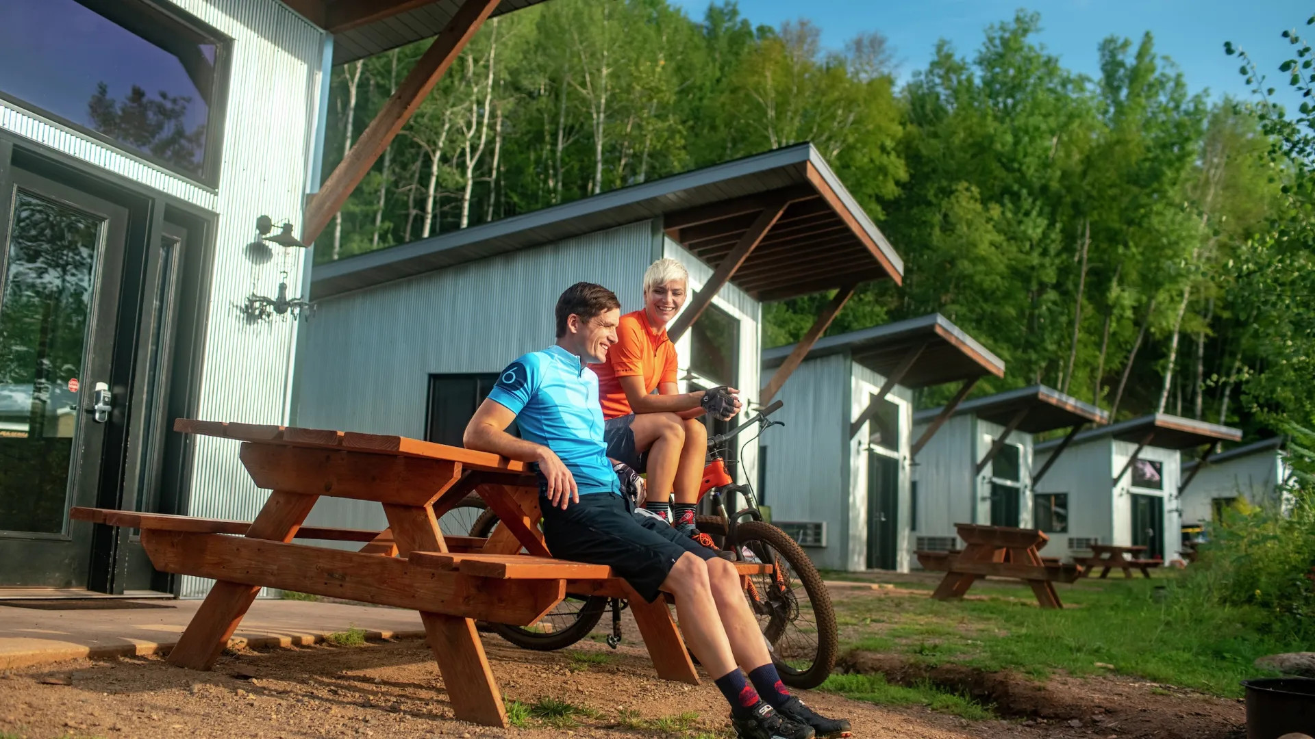 Ironton Cuyuna bike True North Basecamp cabins couple
