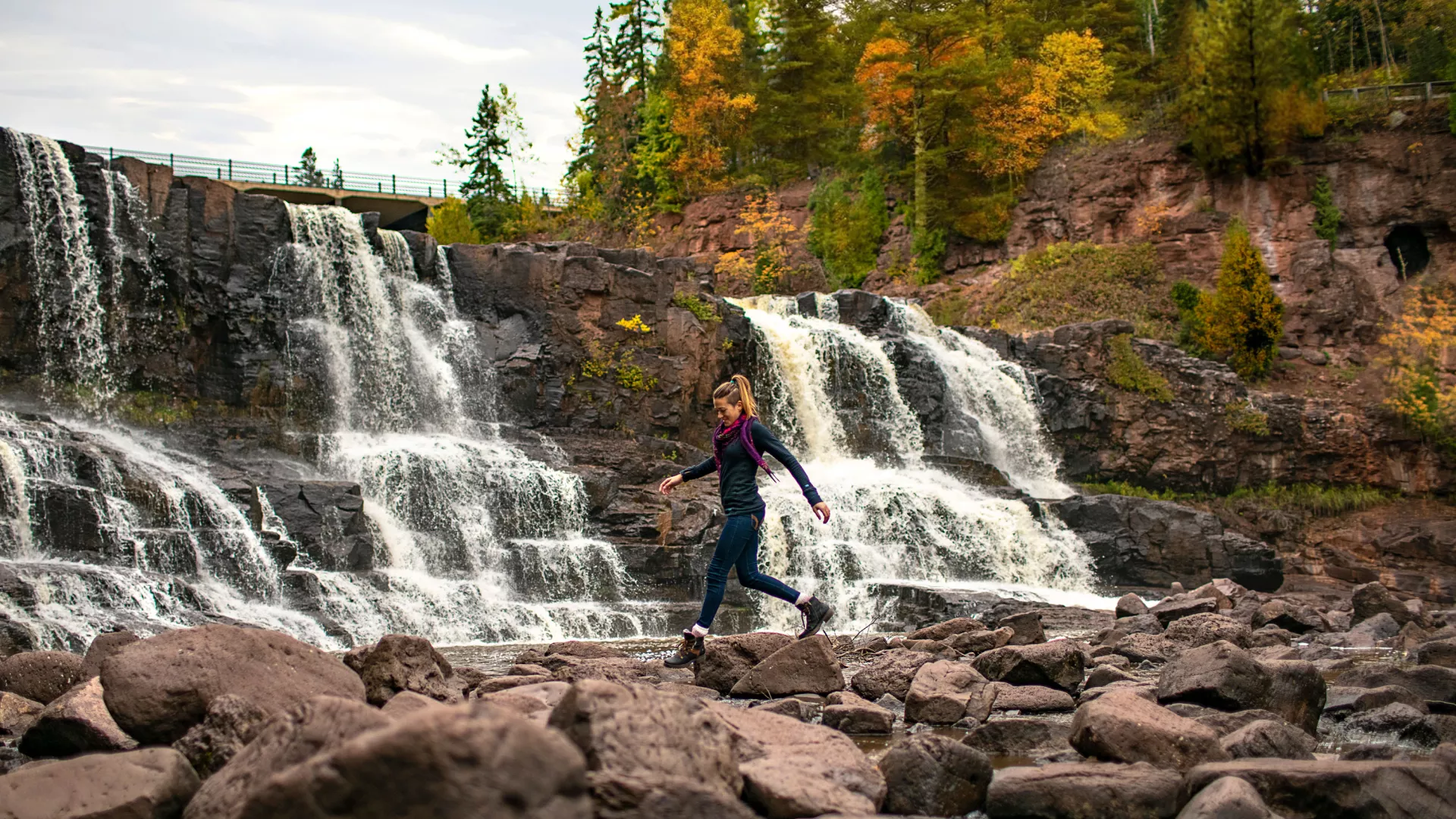 Woman hiking at Gooseberry Falls State Park