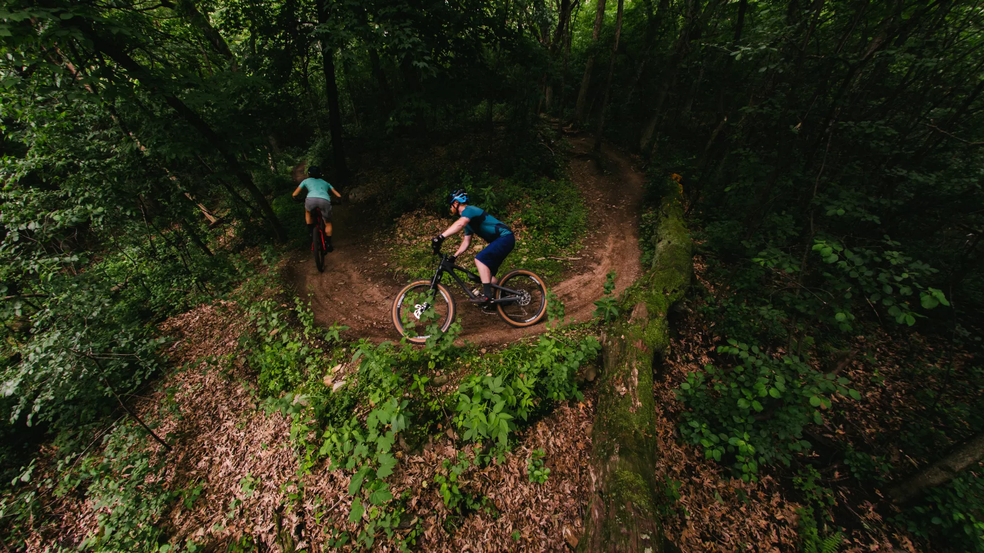 Mountain bikers take a berm at Lebanon Hills