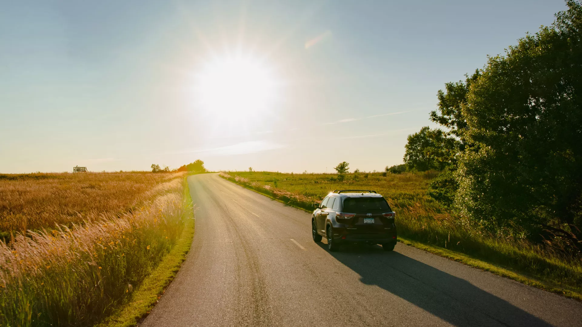 Luverne car driving through prairie