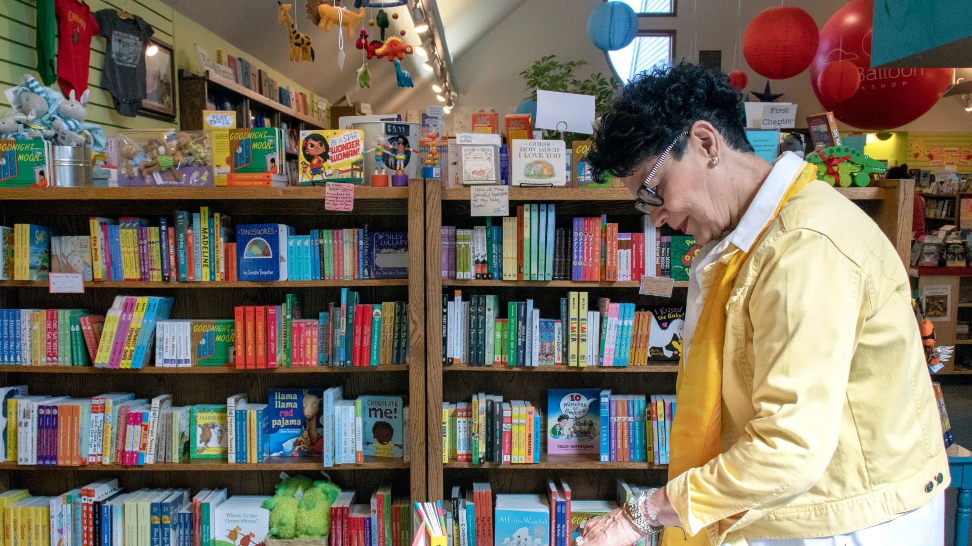 Woman shopping at Red Balloon Books
