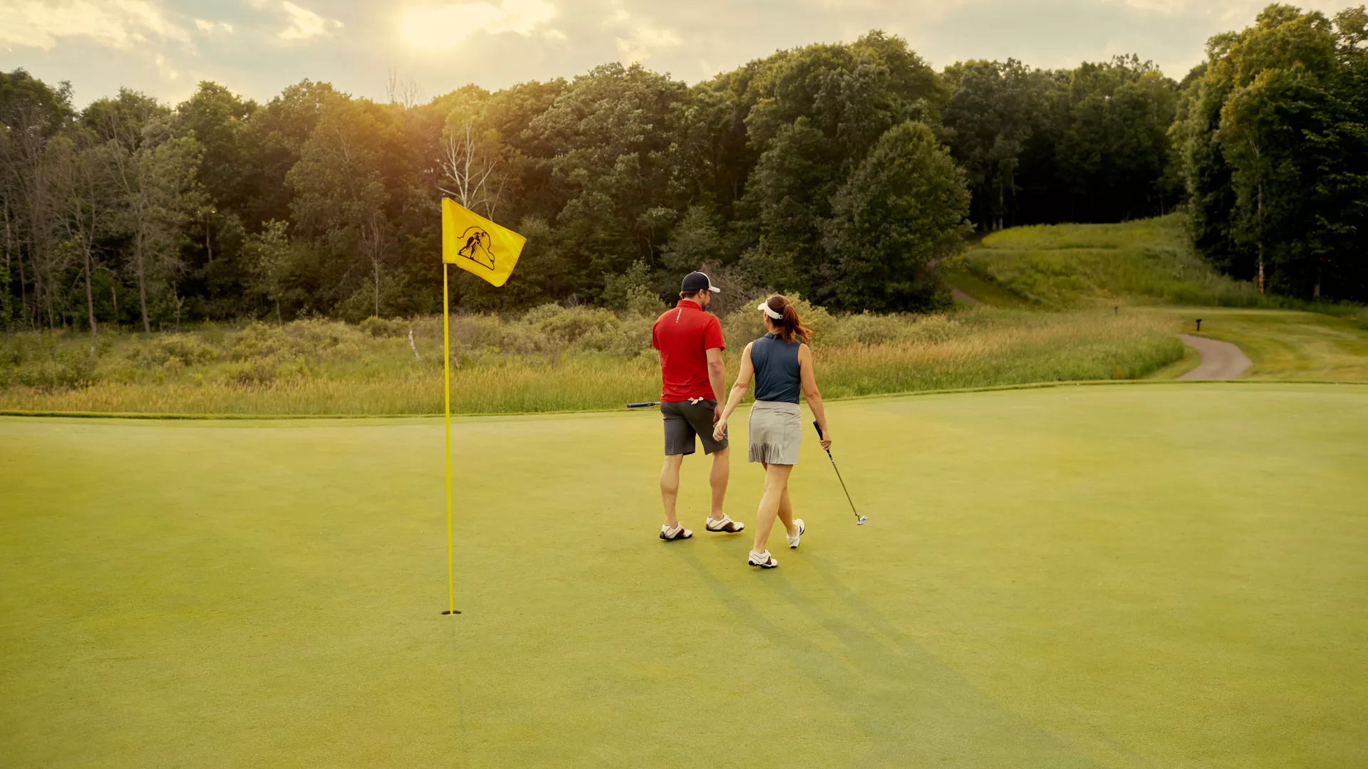 Couple on a golf green