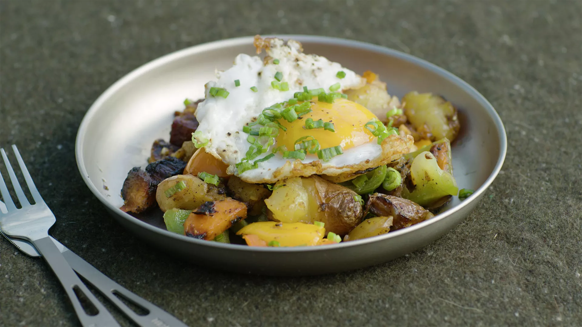Smoked Pork Belly hash with grilled vegetables and duck eggs