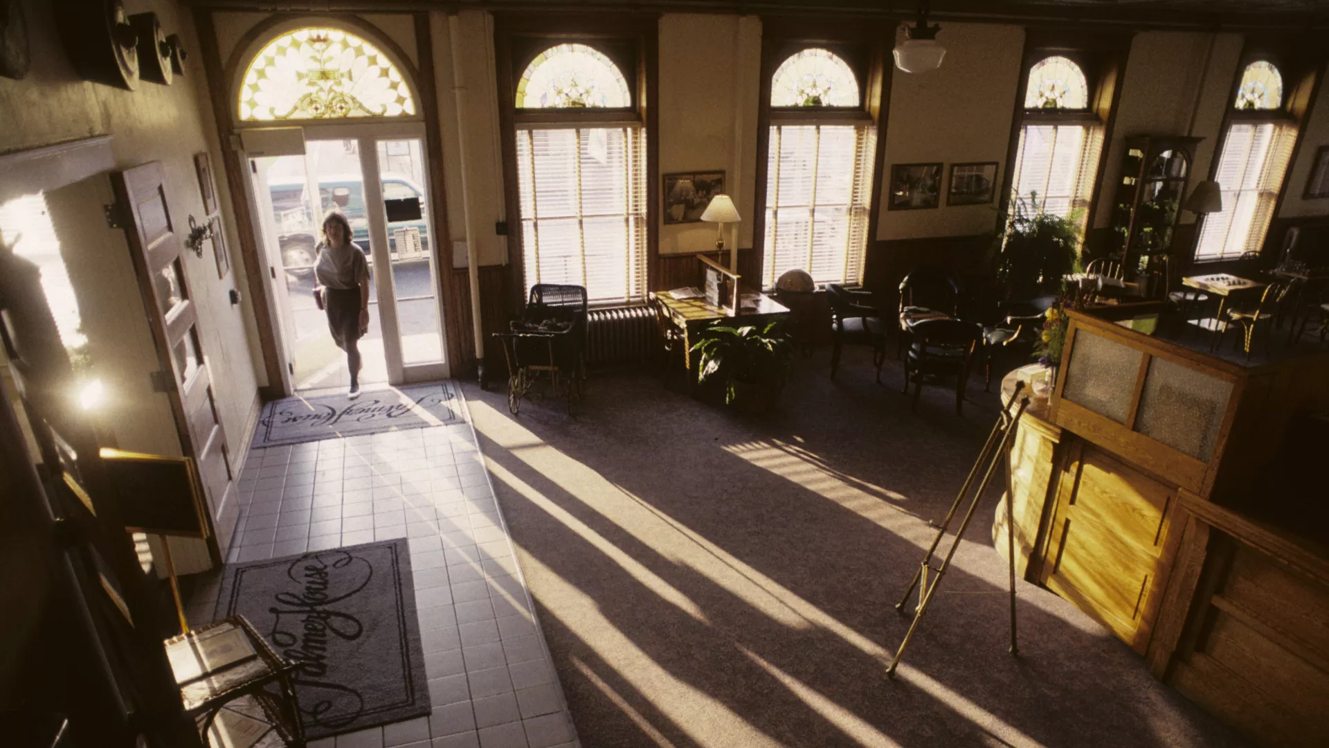 A woman entering the Parmer House Hotel