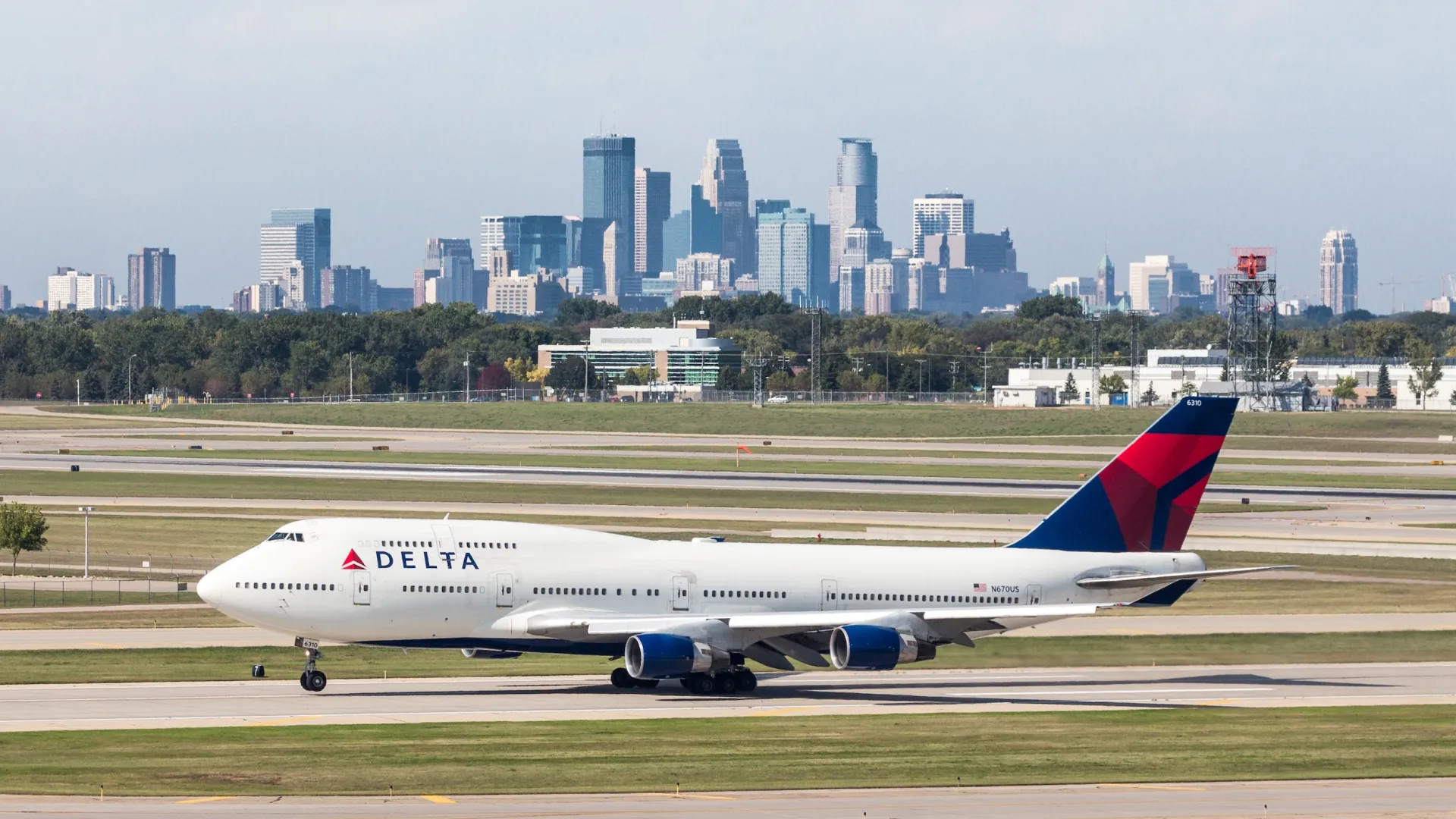 A Delta airplane sits on the tarmac at MSP Airport