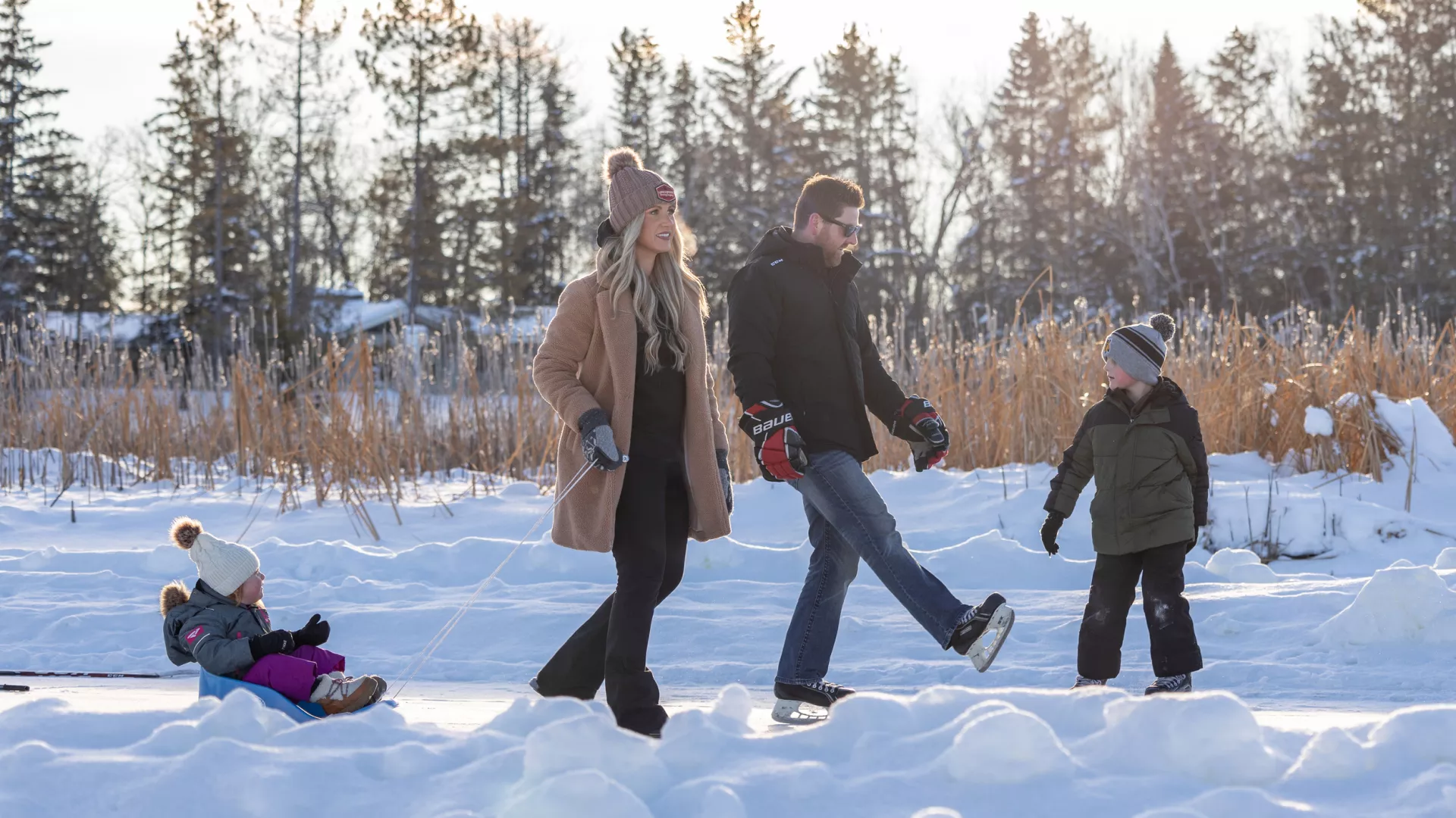 A family on the Riverbend Skate Path in Warroad