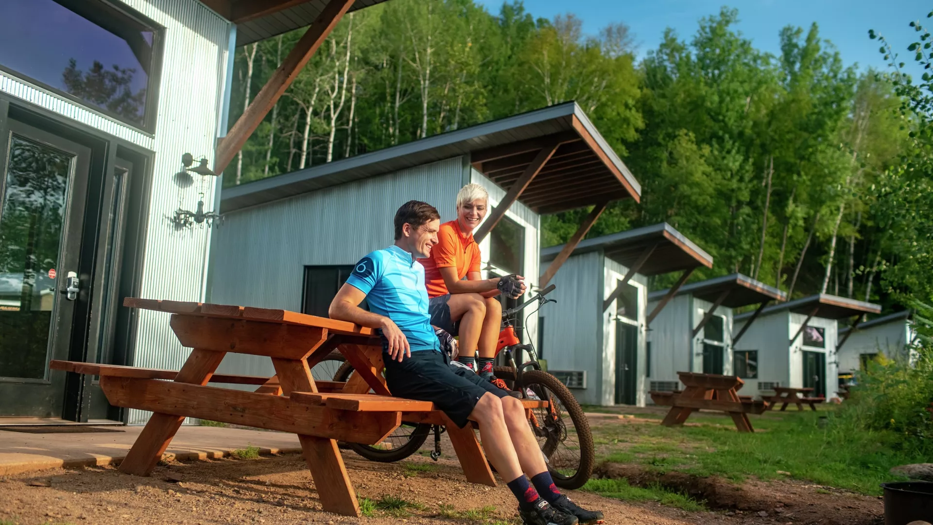 Ironton Cuyuna bike True North Basecamp cabins couple