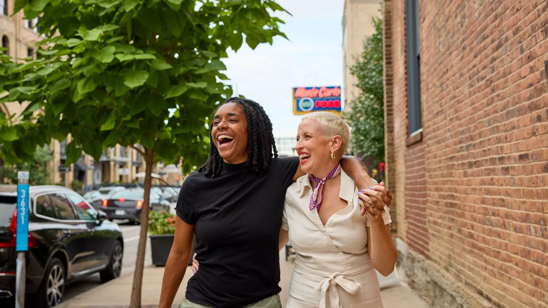 A couple walks around Minneapolis' North Loop neighborhood