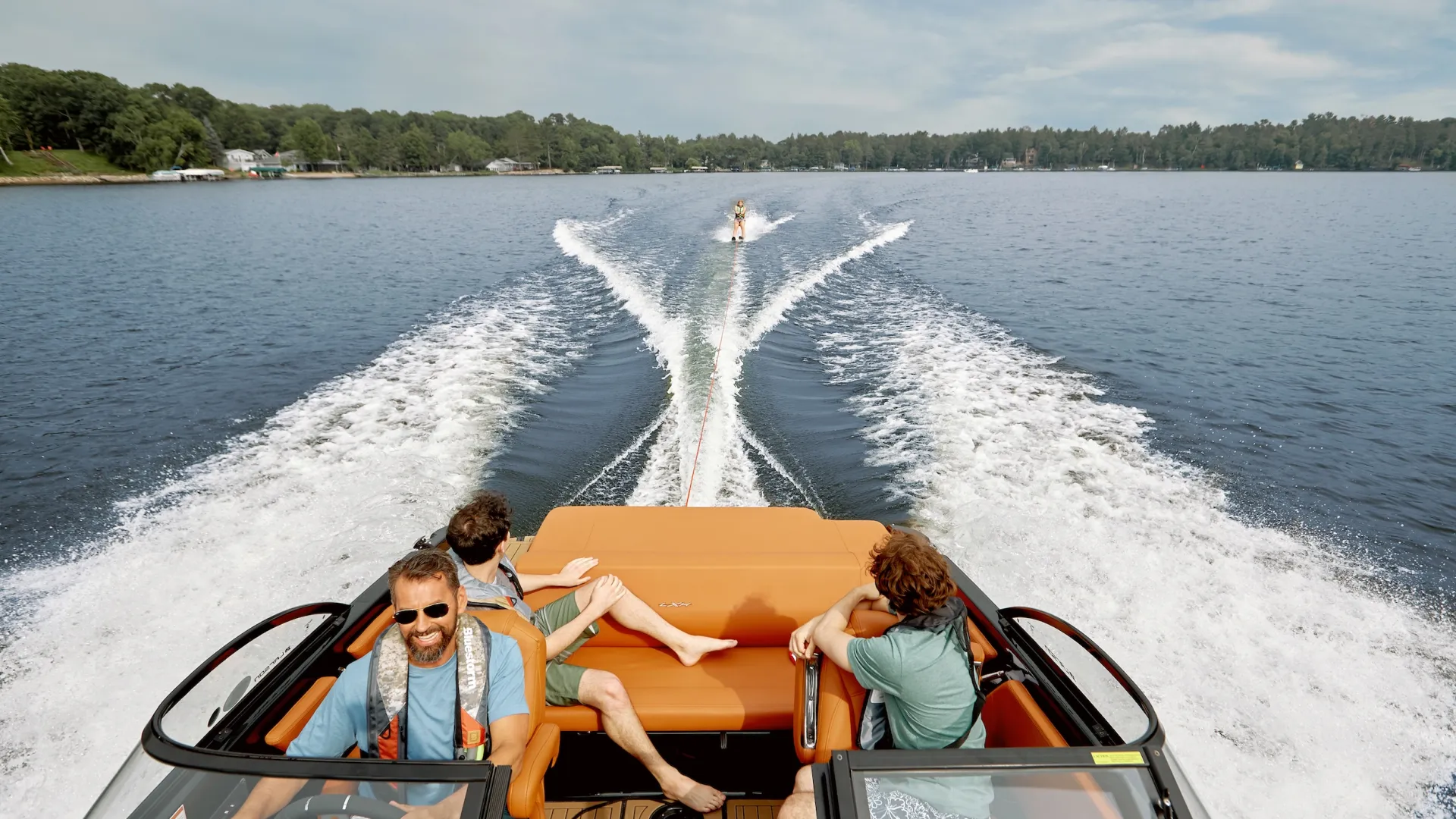 A family boating on Gull Lake