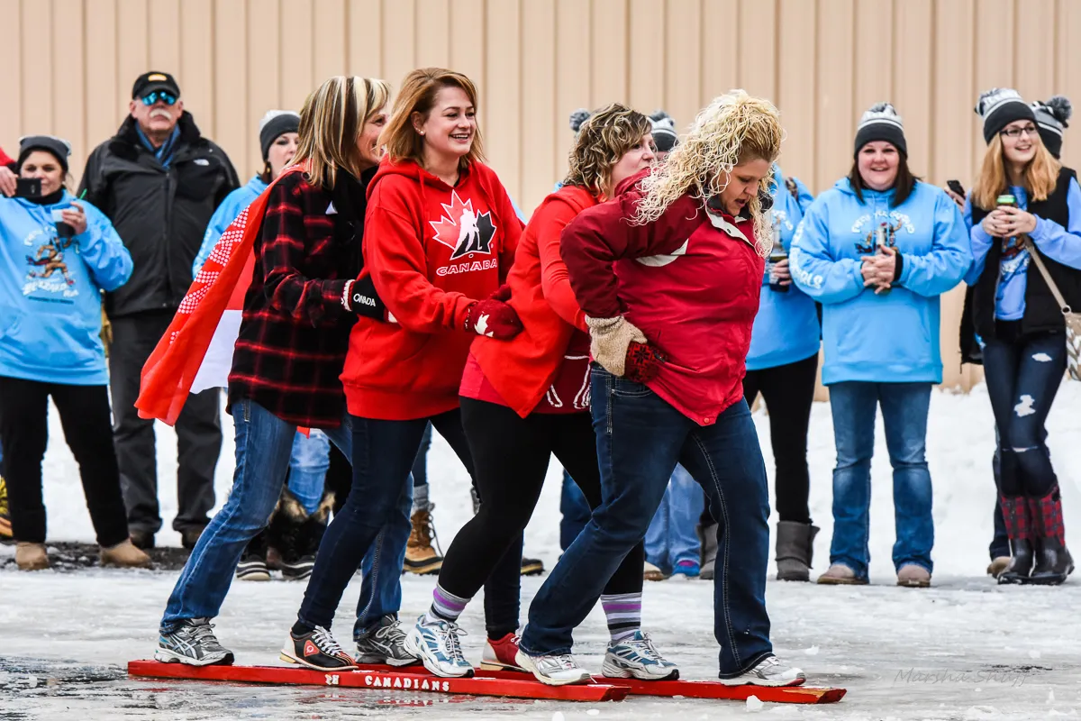 People smooshing at IceBox Days in International Falls