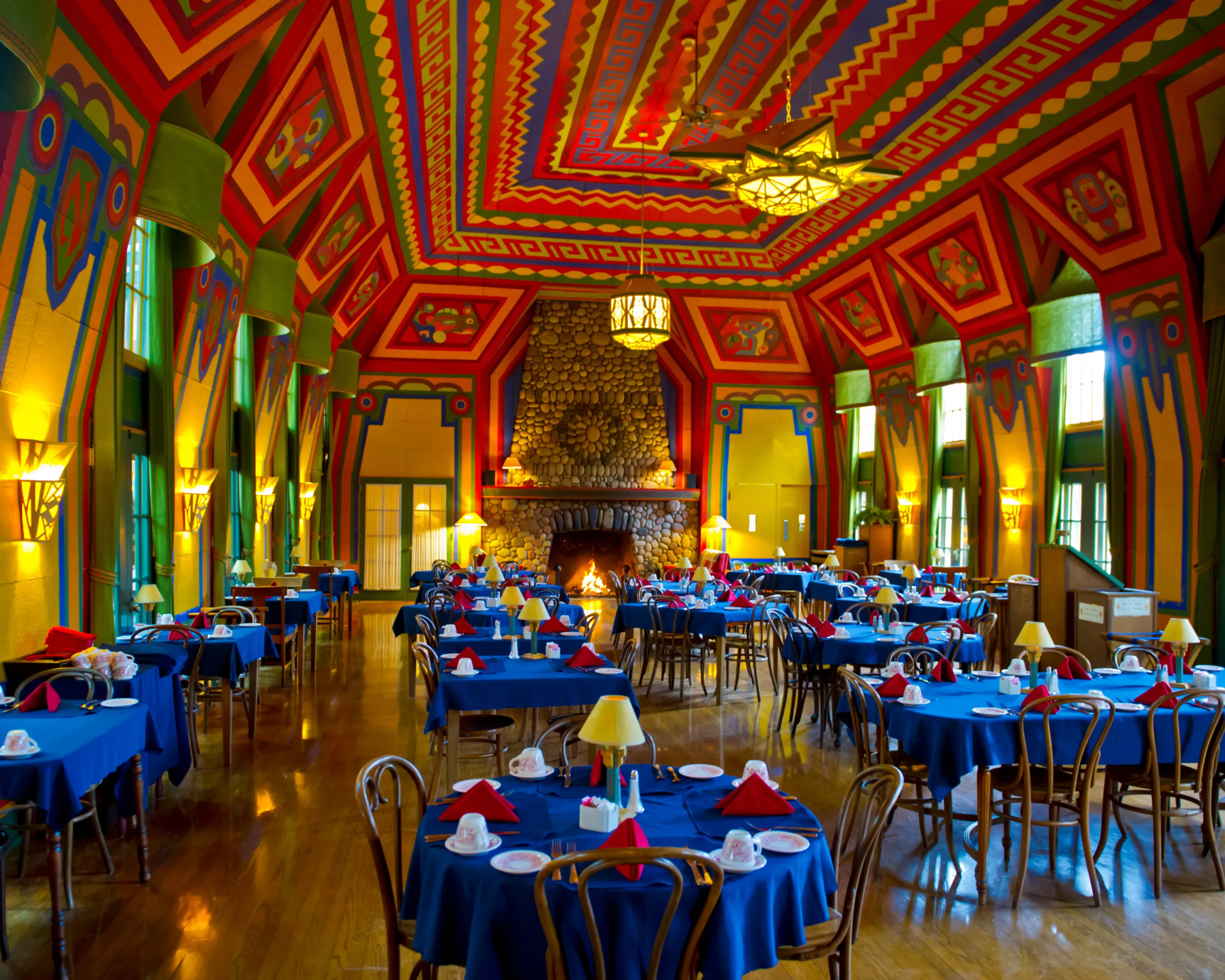The colorful yet formal Naniboujou Lodge dining room in Grand Marais / Spruce Creek Photography