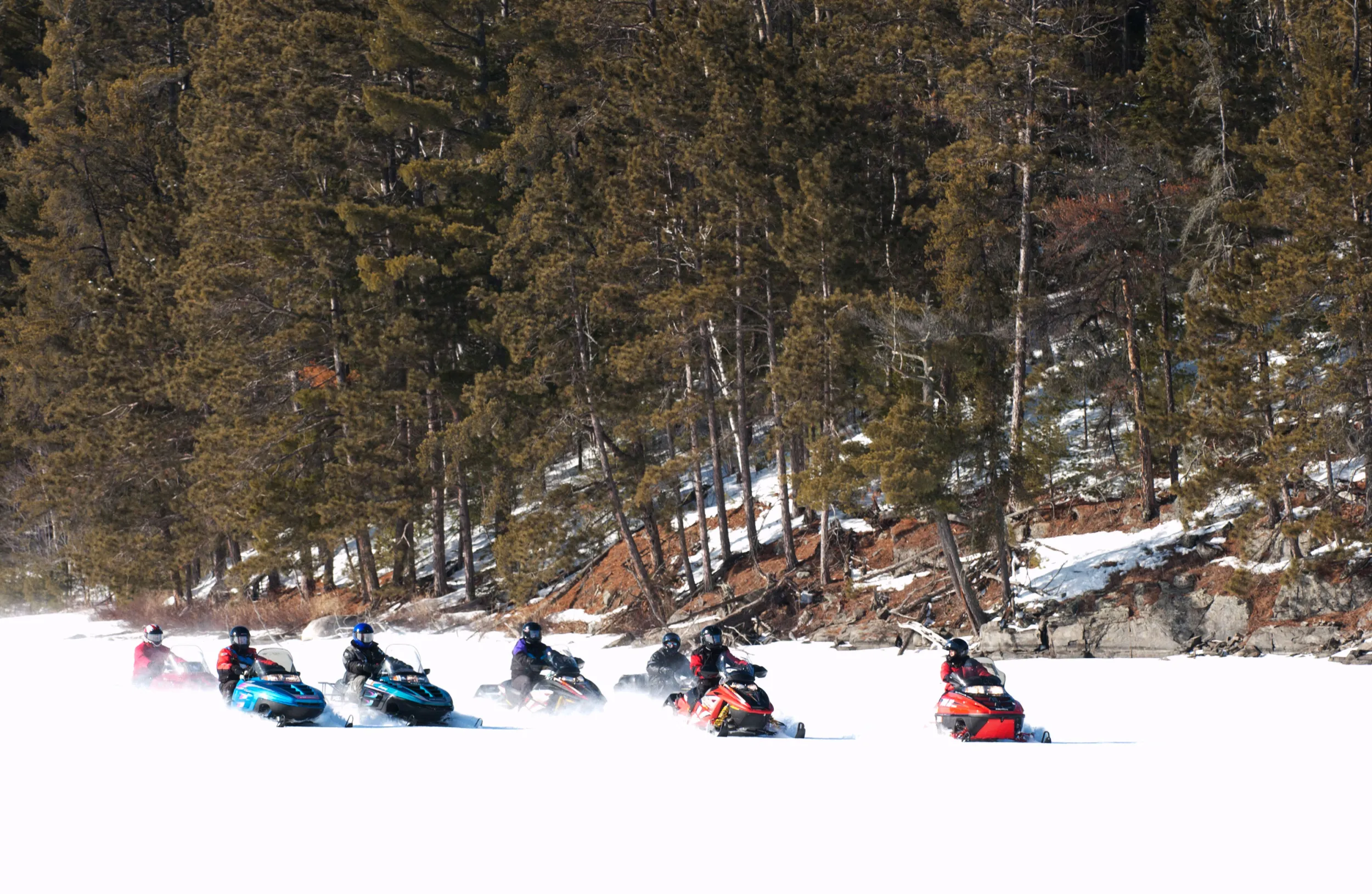 Group snowmobiling in Voyageurs National Park