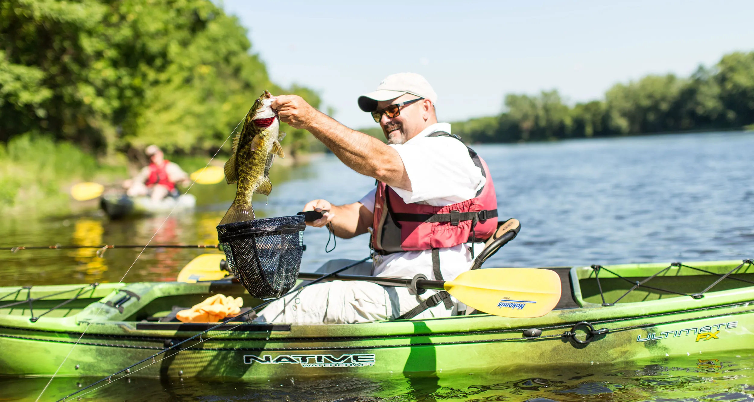 Kayak bass fishing on Mississippi River Saint Cloud