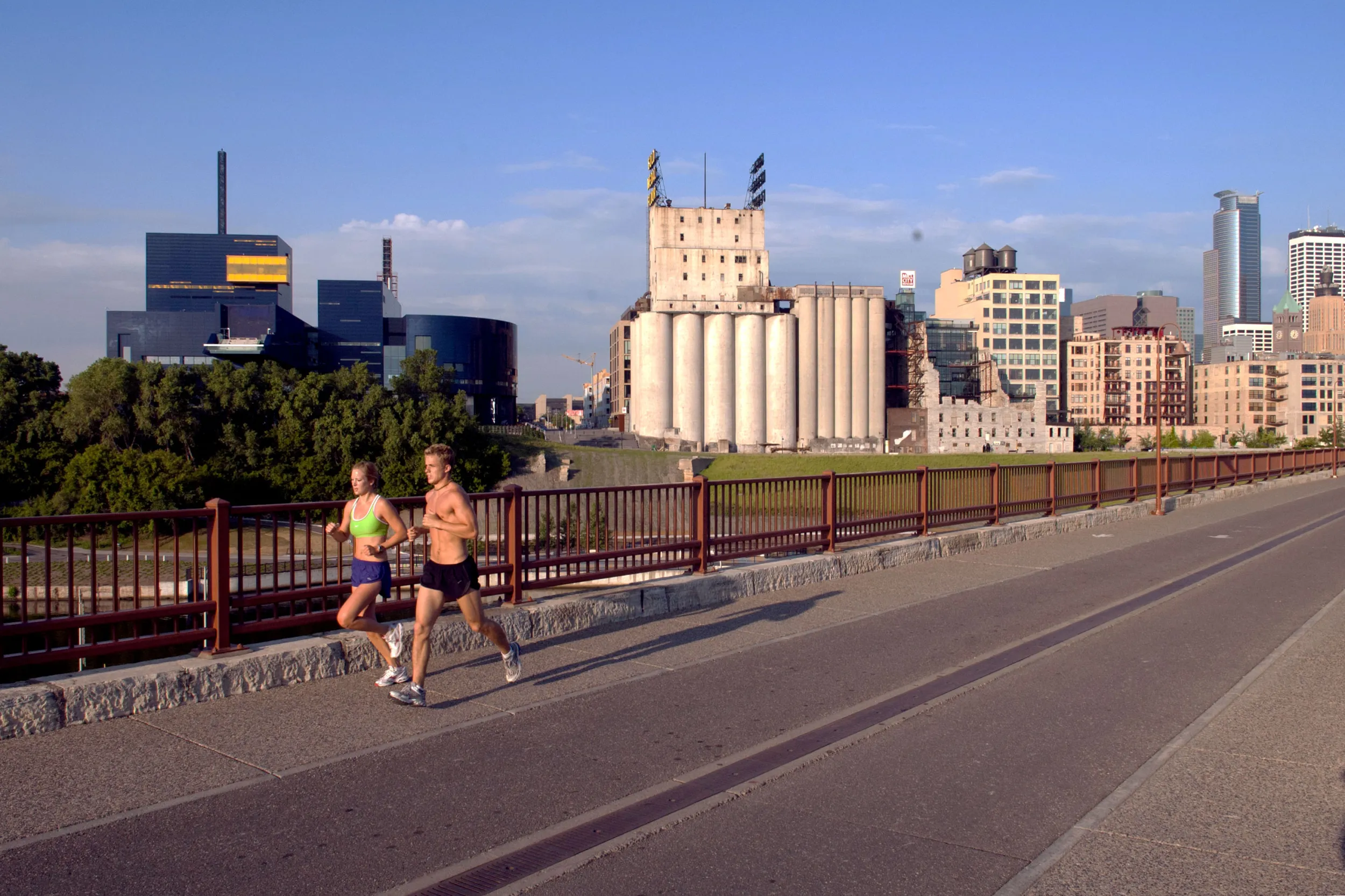 Two runners on the Stone Arch Bridge