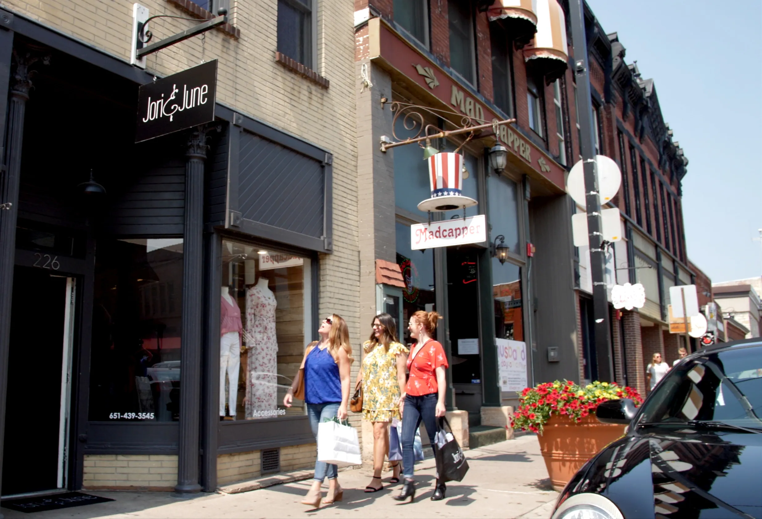 Three women shopping in downtown Stillwater