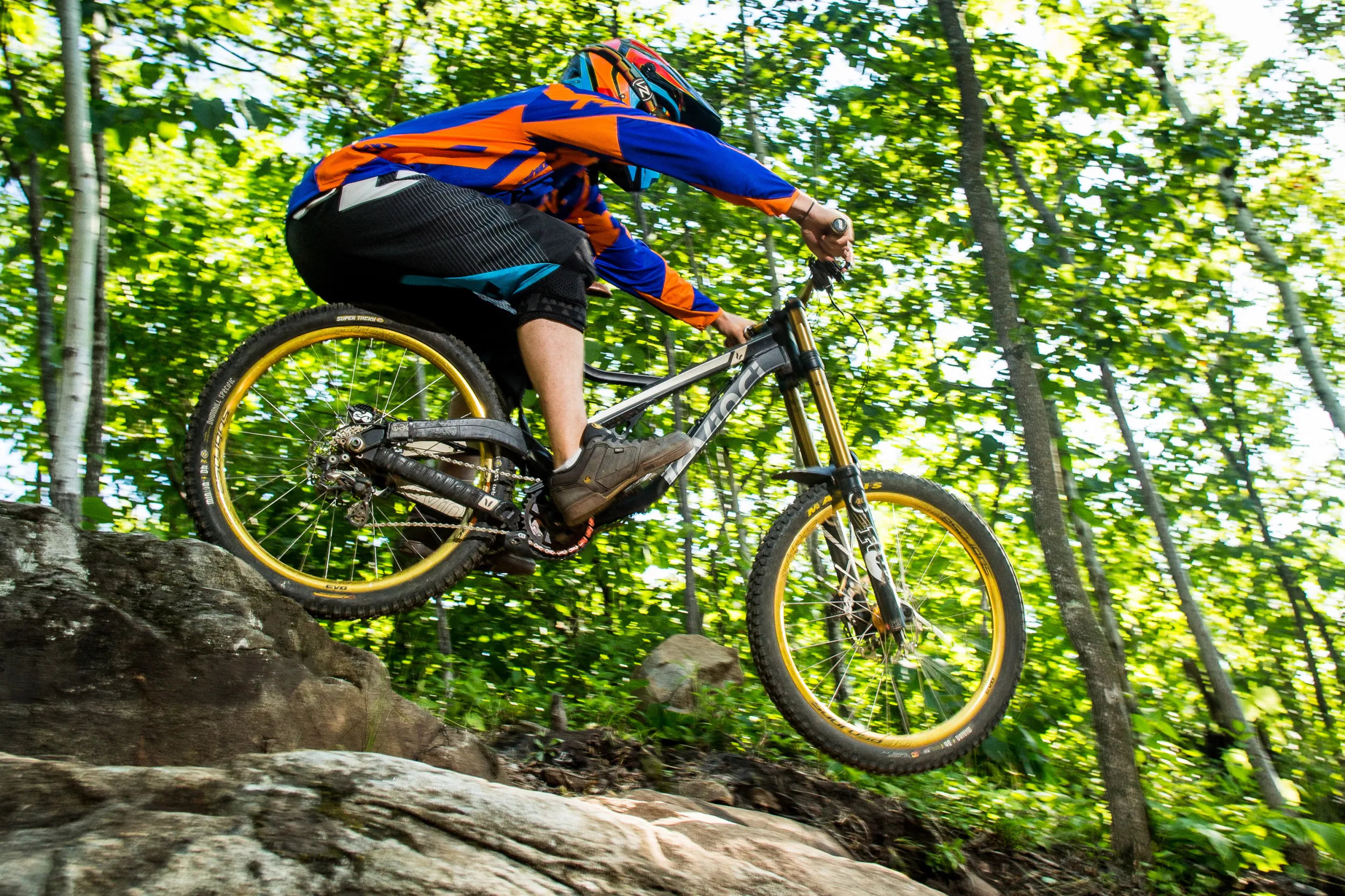 Mountain biker jumping over rocks at Spirit Mountain in Duluth
