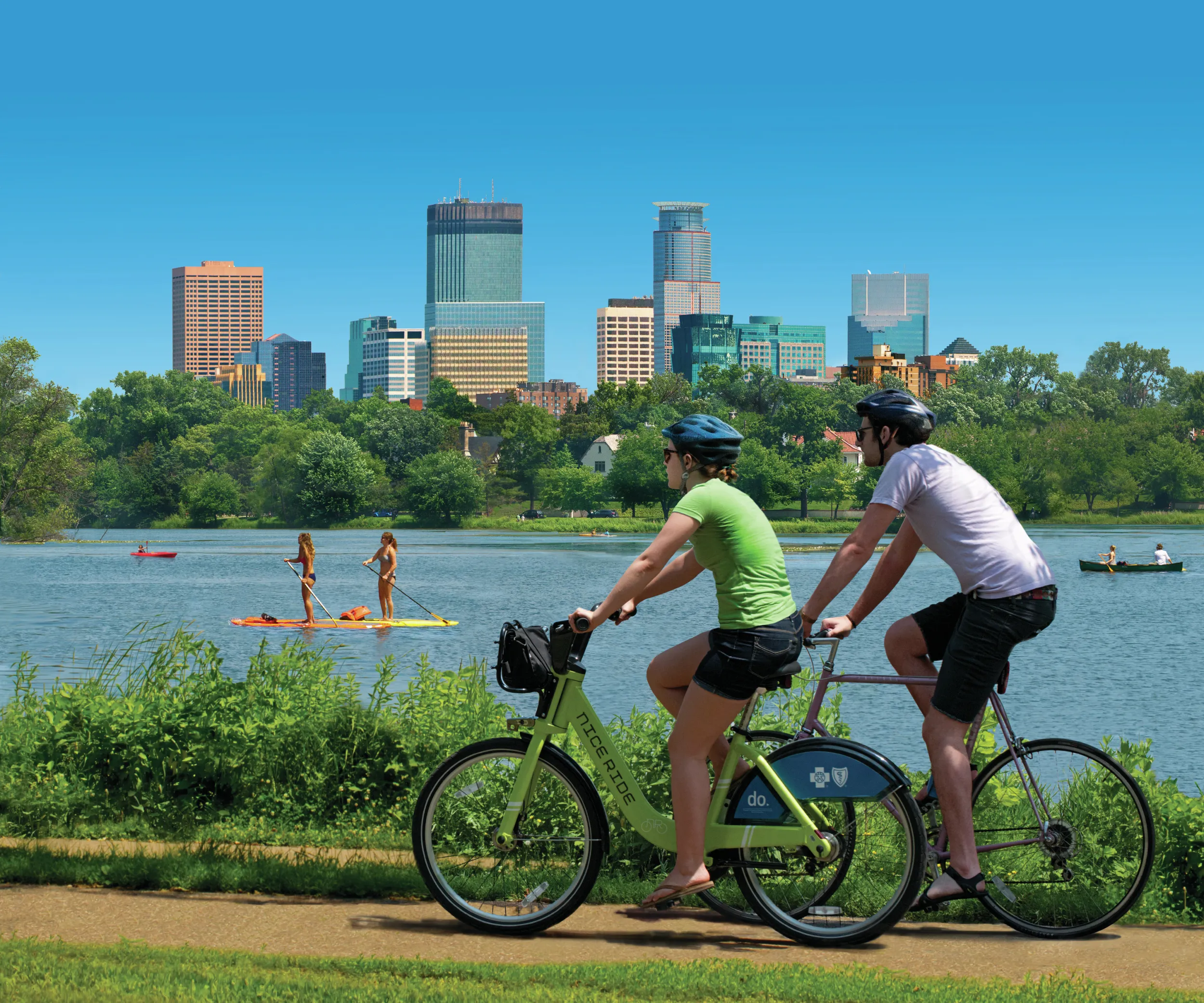 Biking around Bde Maka Ska, Minneapolis skyline in background