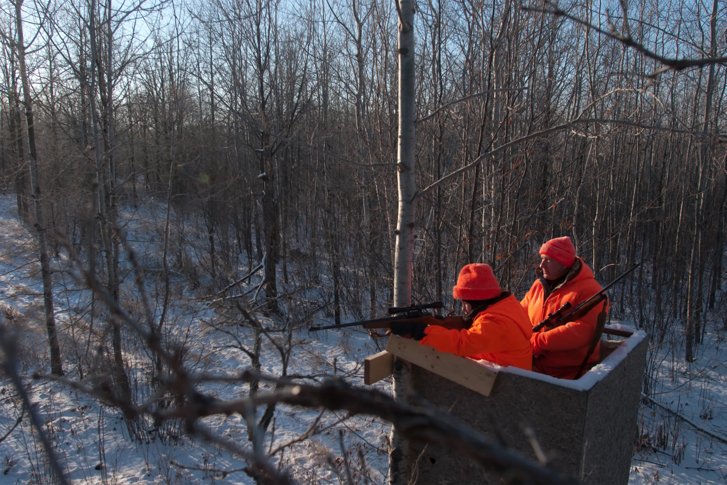 Father and son in deer stand