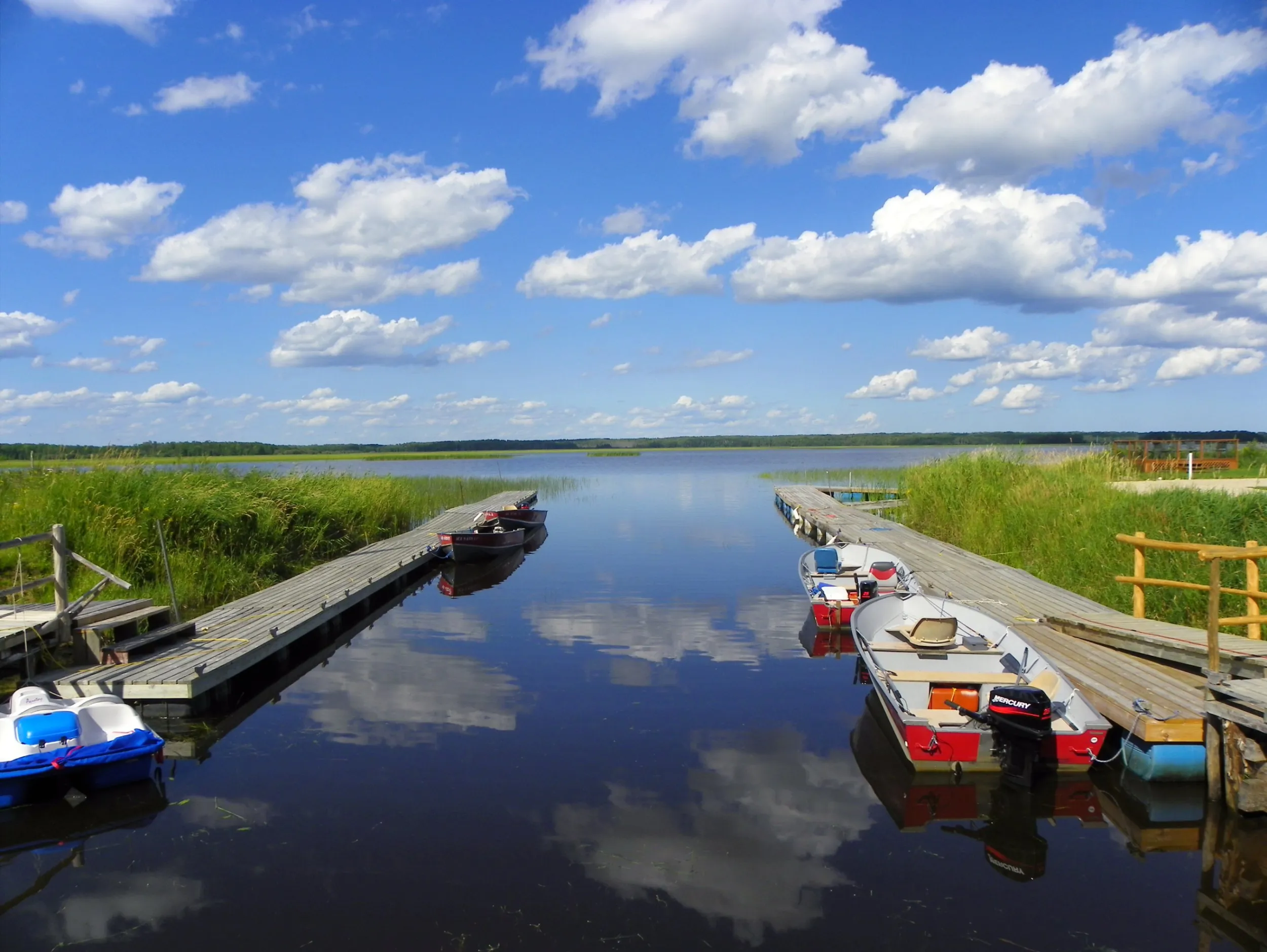 Dock and boats on a clear, sunny day on the Northwest Angle