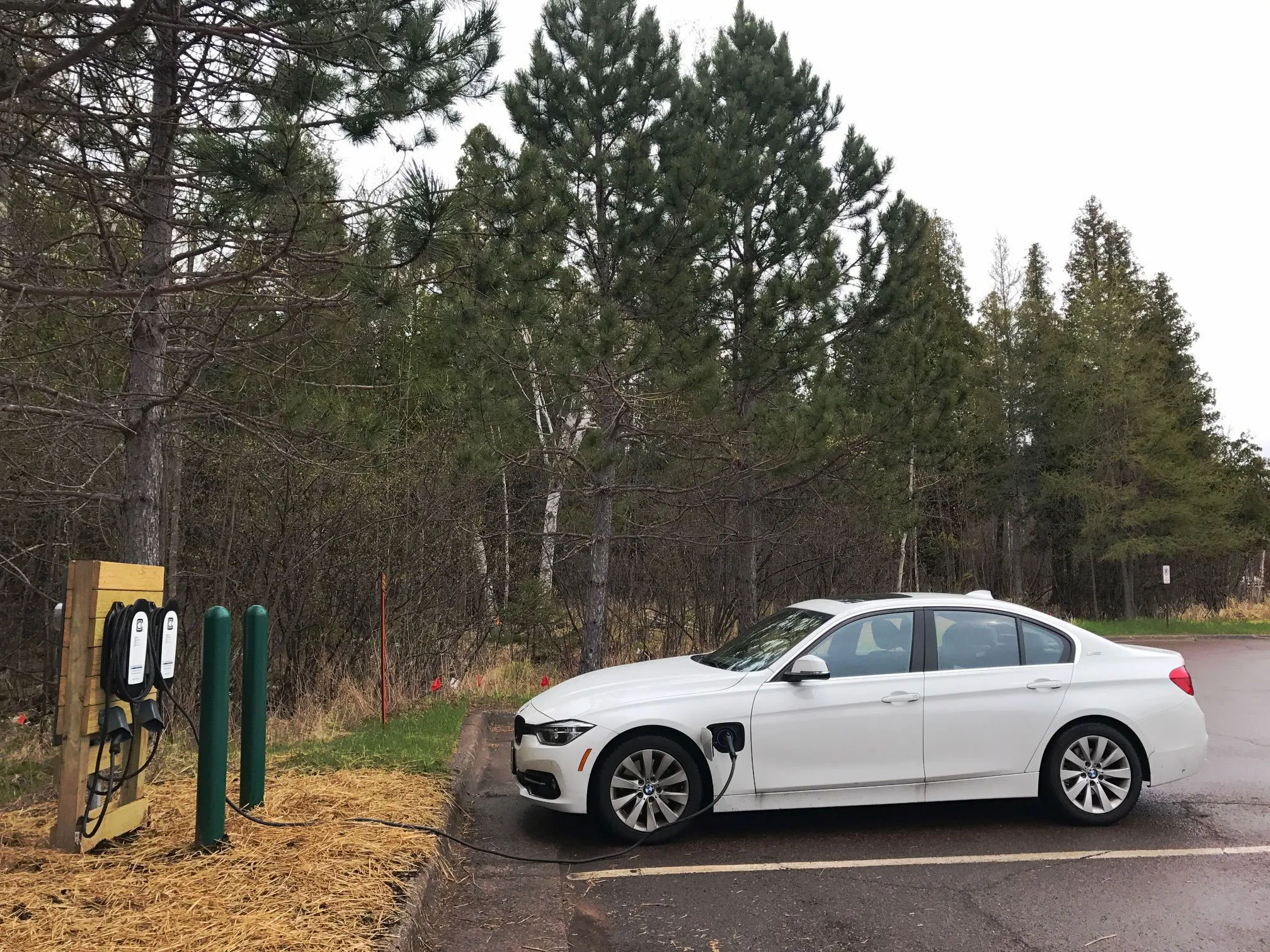 Electric Vehicle plugged into the fast-charging station at Gooseberry Falls State Park